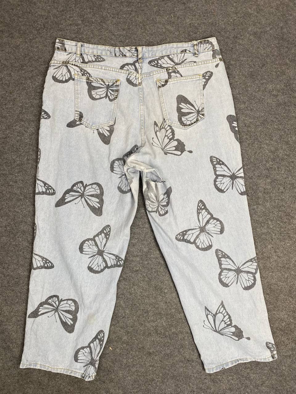 image of s Butterfly All Over Print Distressed Denim in Light Blue, Women's (Size 41)