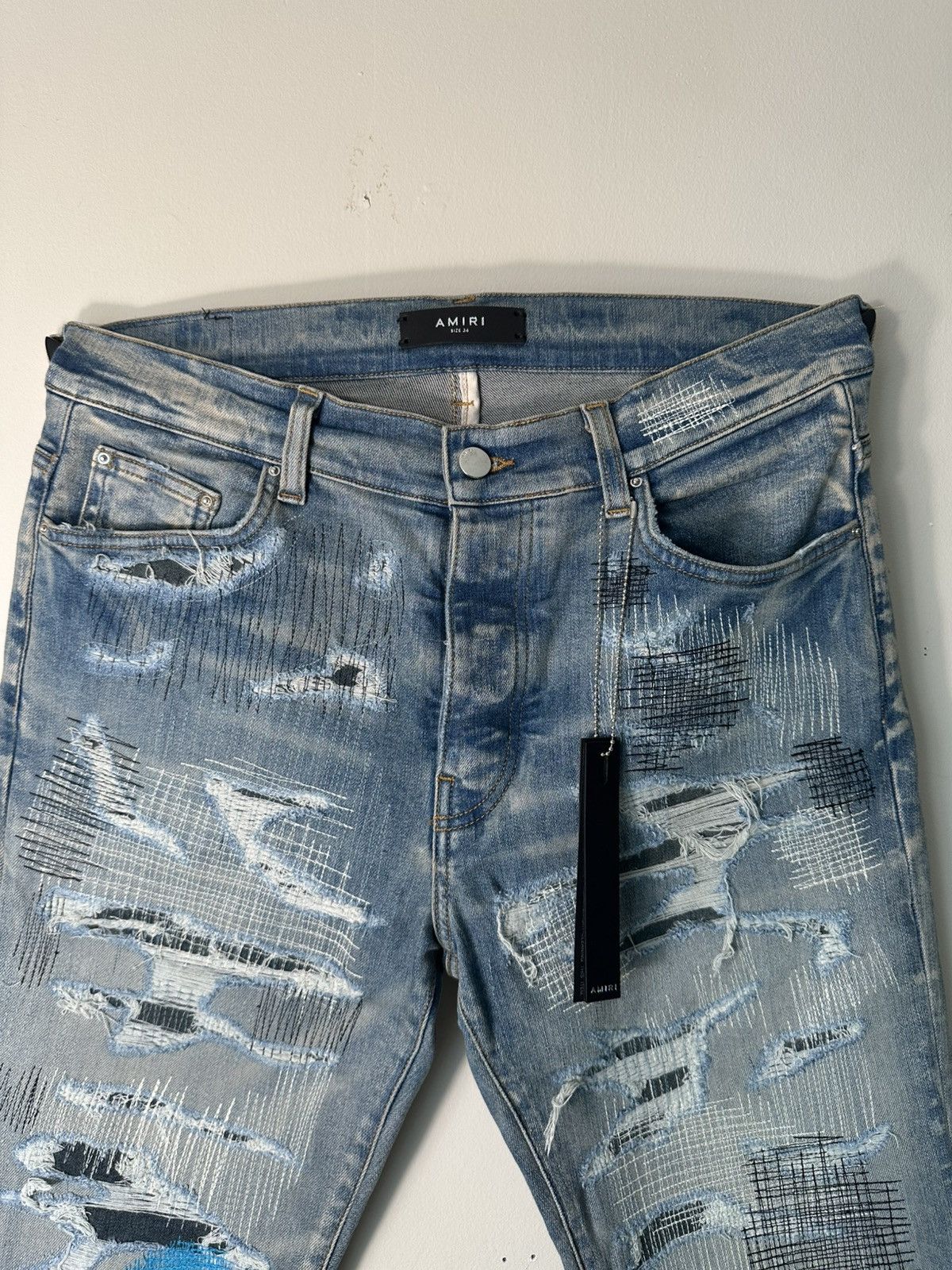Amiri All Over Stitches Repair Clay Indigo Jeans