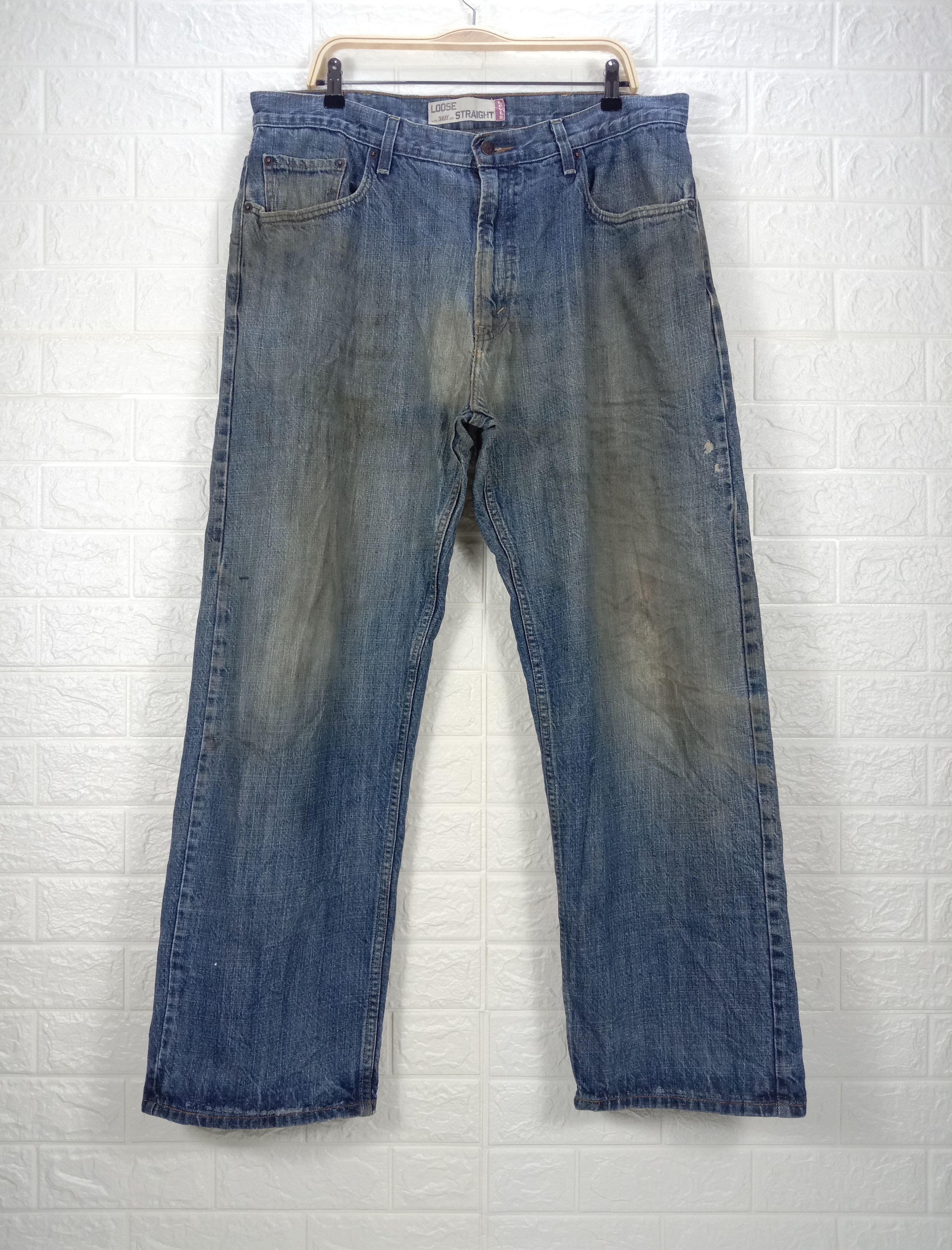 image of Distressed Denim x Levis Vintage Levi's 569 Jeans Dirty Wash Loose Straight Denim in Blue (Size 38)