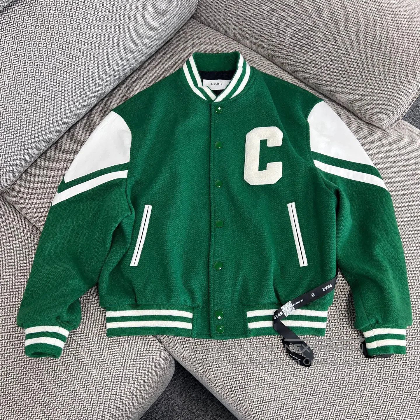 celine letter patch baseball jacket in green.