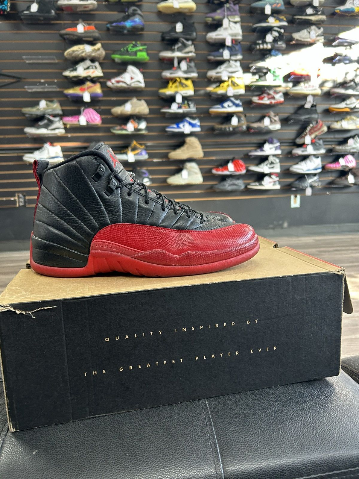 image of Jordan Brand 12 Flu Games Shoes in Black, Men's (Size 11)