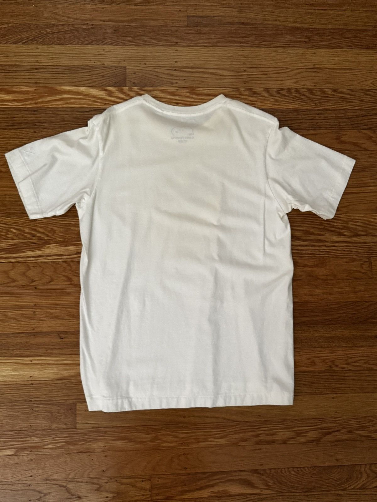 Kaws × Uniqlo Uniqlo Kaws Snoopy T-shirt White - size Medium Size US M / EU 48-50 / 2 - 4 Thumbnail
