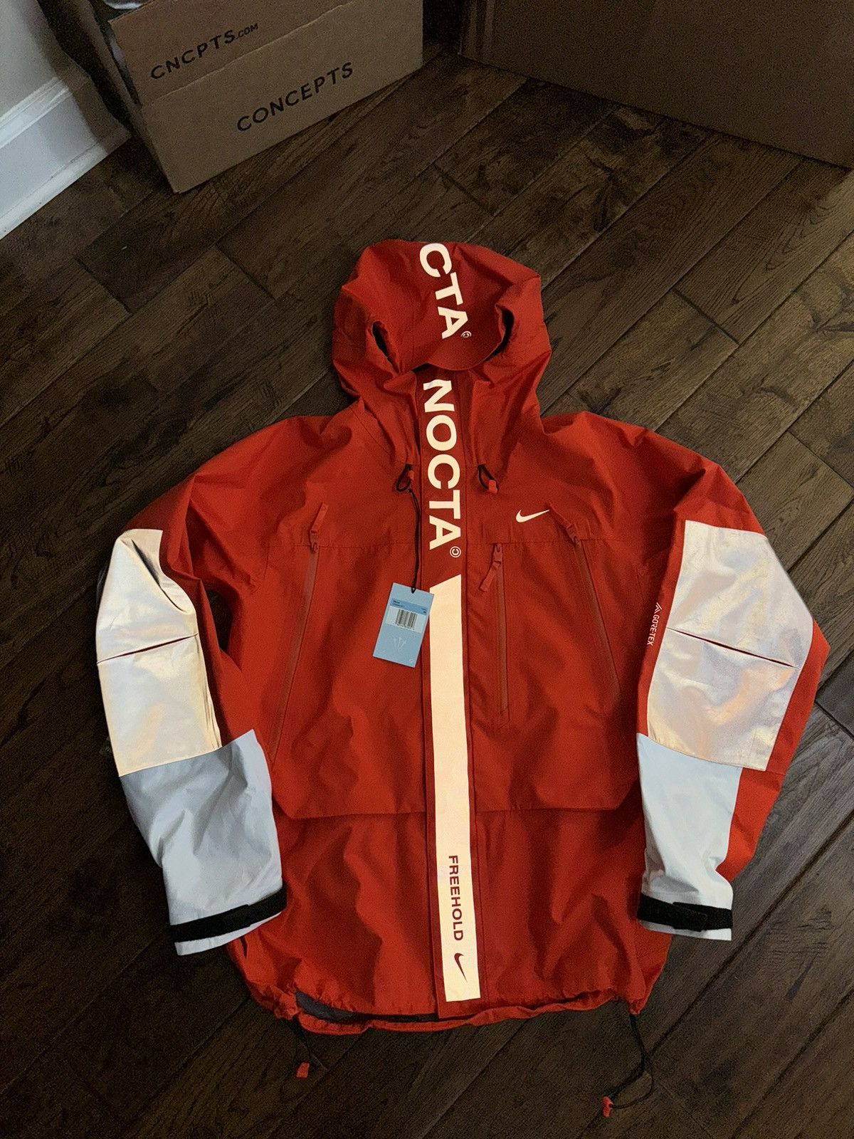 image of Drake x Goretex Nocta Alien Tungsten Gore-Tex Shell Jacket in Orange, Men's (Size Large)