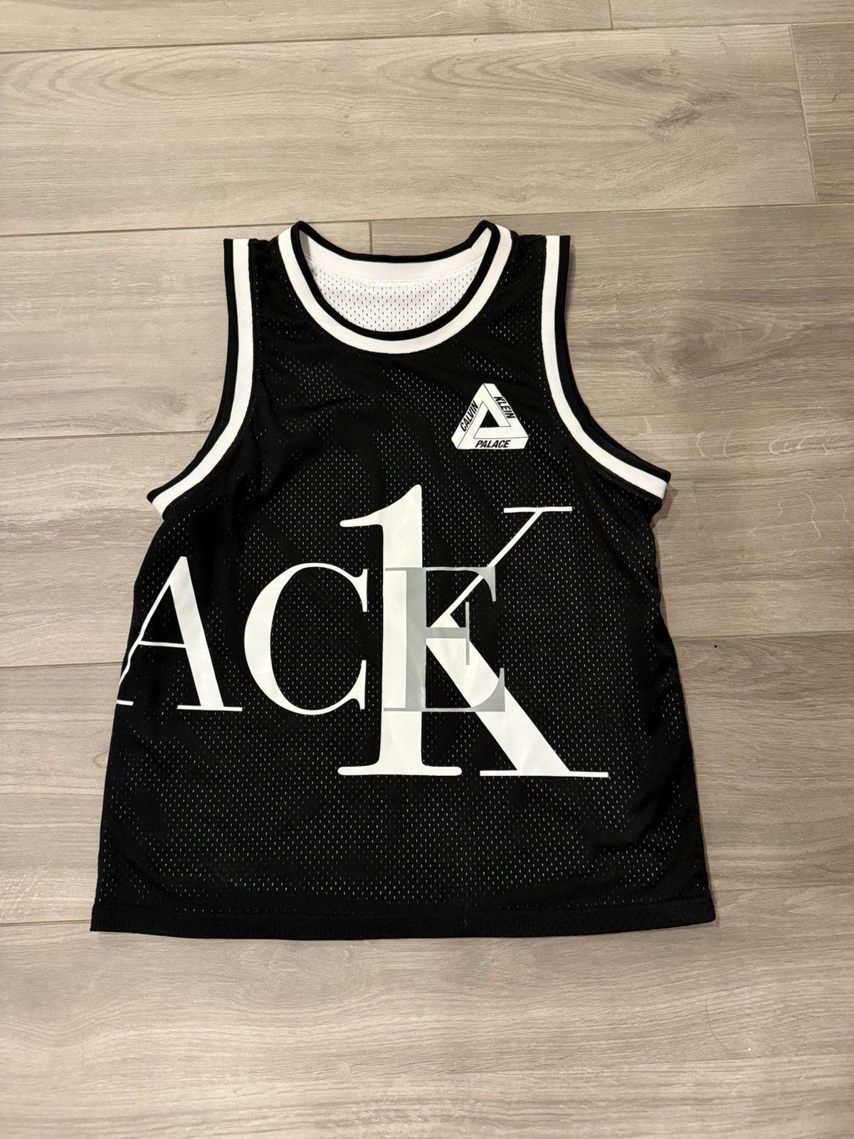 Oakley × Palace Palace x Oakley Tech Jersey Black | Grailed