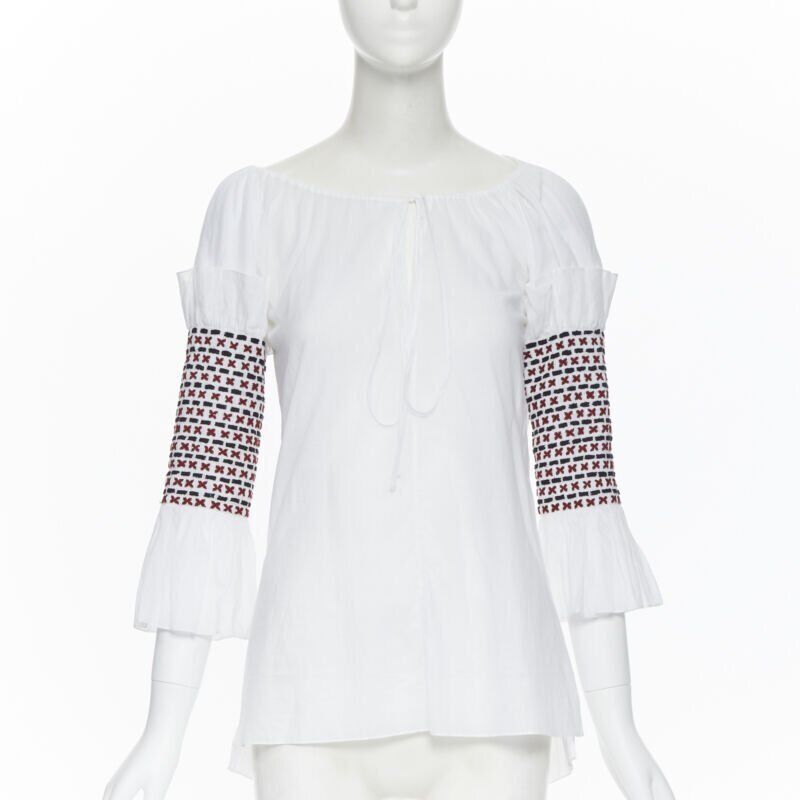 Rosie Assoulin new ROSIE ASSOULIN white ethnic embroidery smocked sleeves off shoulder top US0 Size XS / US 0-2 / IT 36-38 - 1 Thumbnail