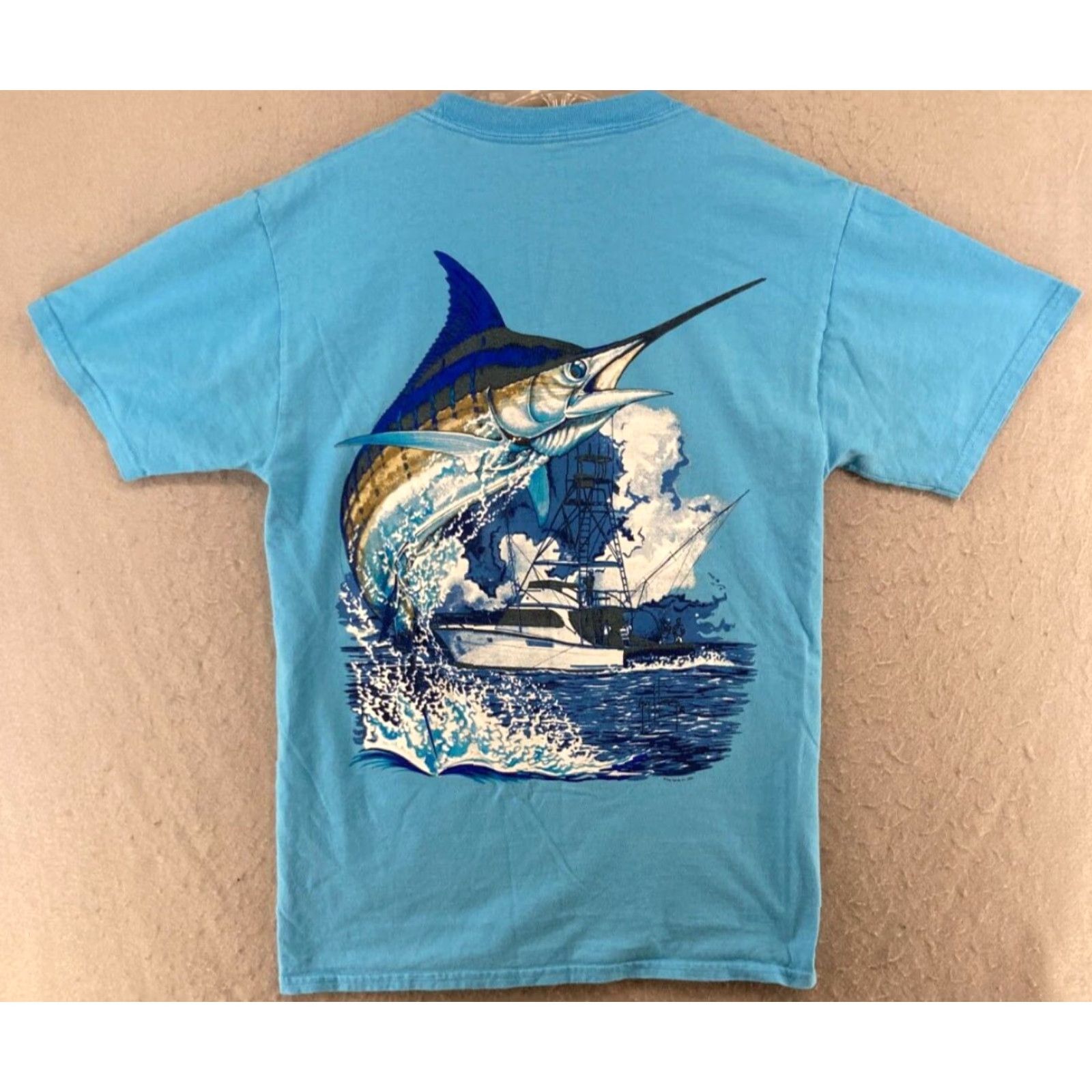 Guy Harvey Guy Harvey AFTCO Mens TShirt Small Blue Sailfish Fishing Outdoor Shirt Adult S Blue Sailfish Graphic Print Crew Neck Cotton Jersey Short Sleeve Size US S / EU 44-46 / 1 - 6 Thumbnail