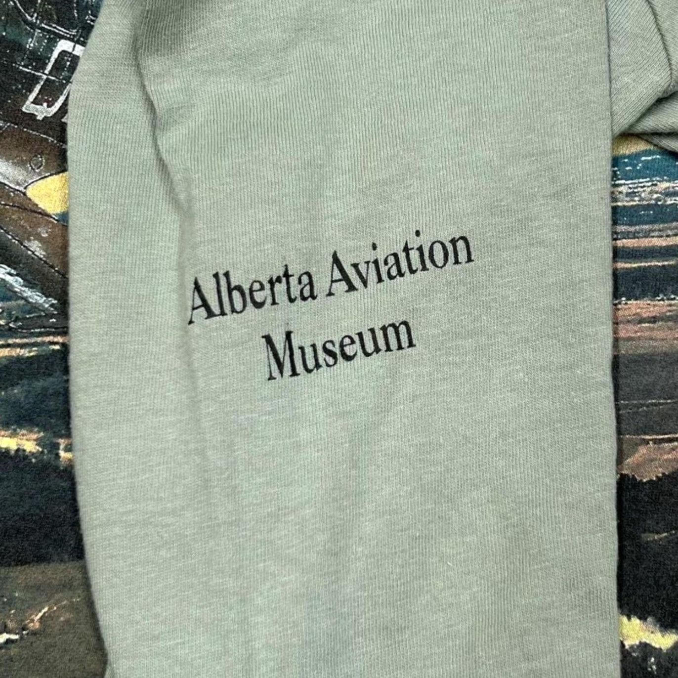 Hanes VINTAGE Hanes Beefy (1997) Alberta Aviation Museum “Spitfire” Long Sleeve T-Shirt Medium Green Mens Shirt Size US M / EU 48-50 / 2 - 5 Thumbnail