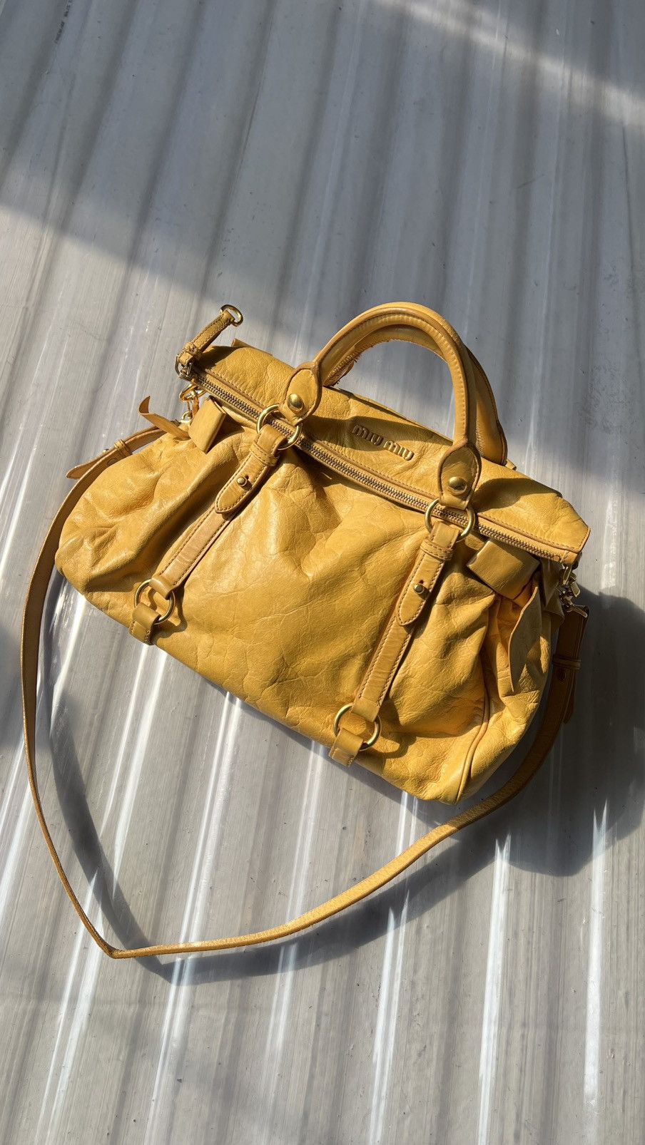 Miu miu vitello lux bow in yellow