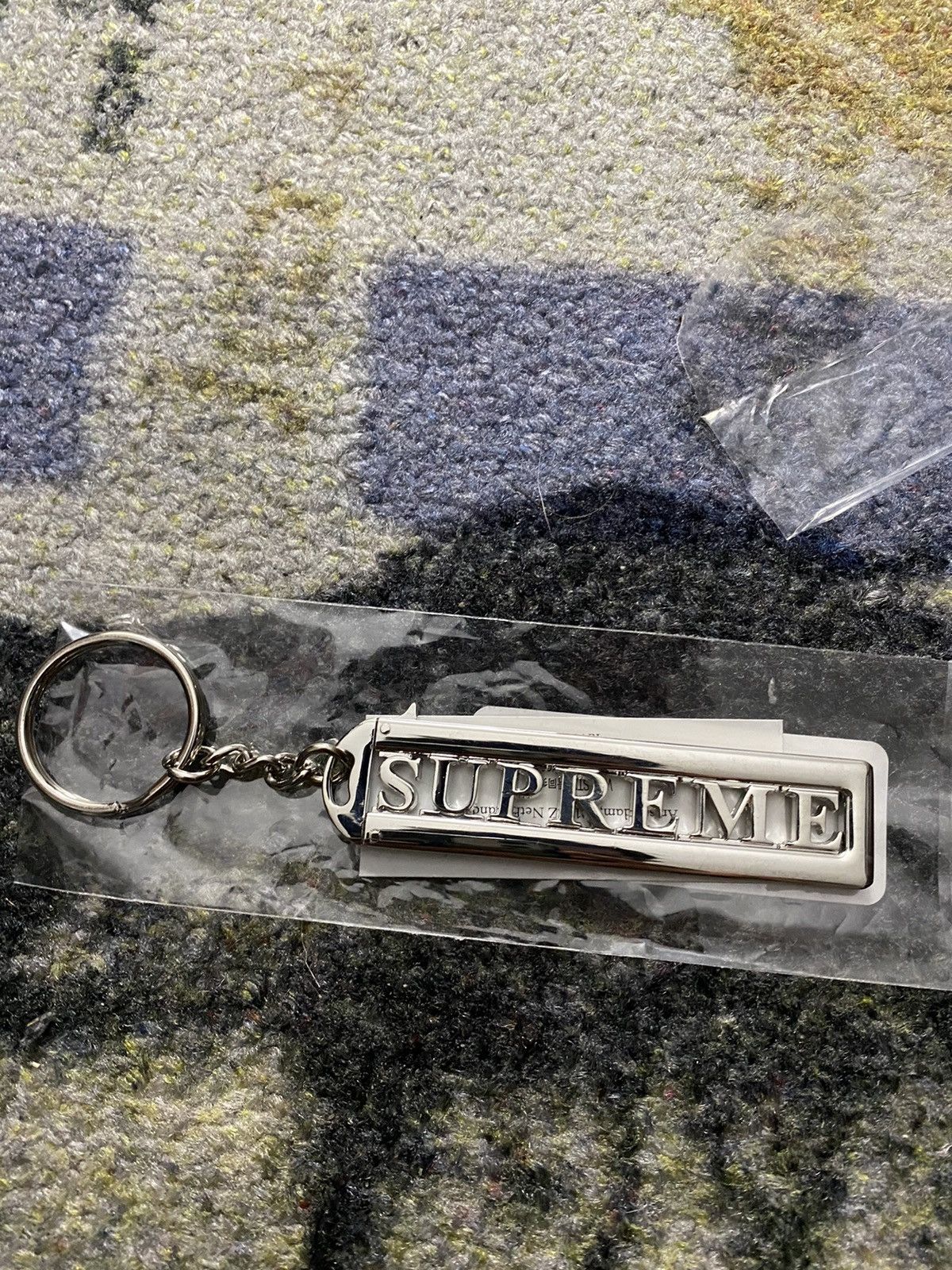 Supreme Supreme Slide Keychain Silver Size ONE SIZE - 1 Thumbnail