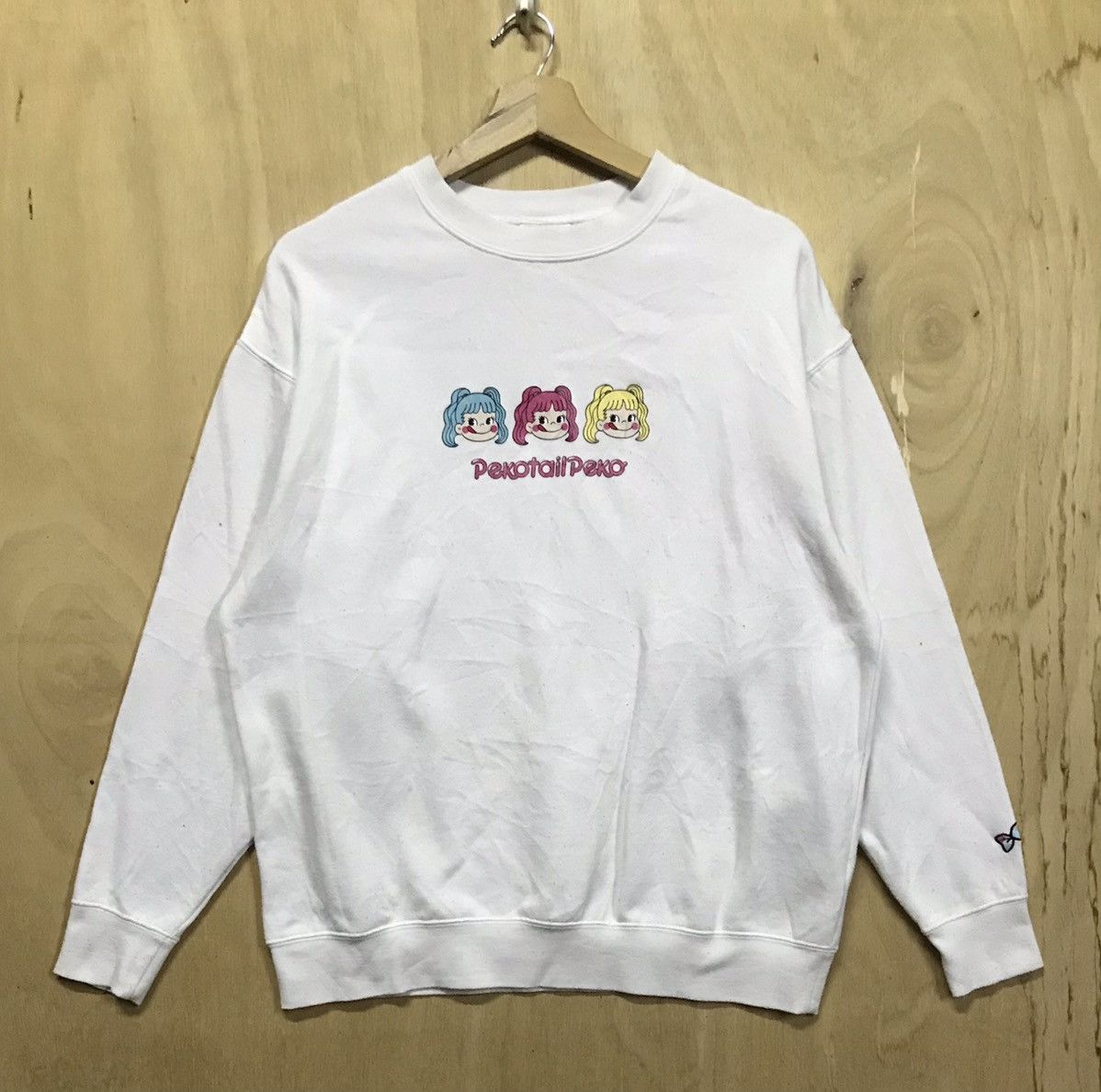 image of Cartoon Network Sanrio Peko-Chan Sweatshirts in White, Women's (Size Medium)