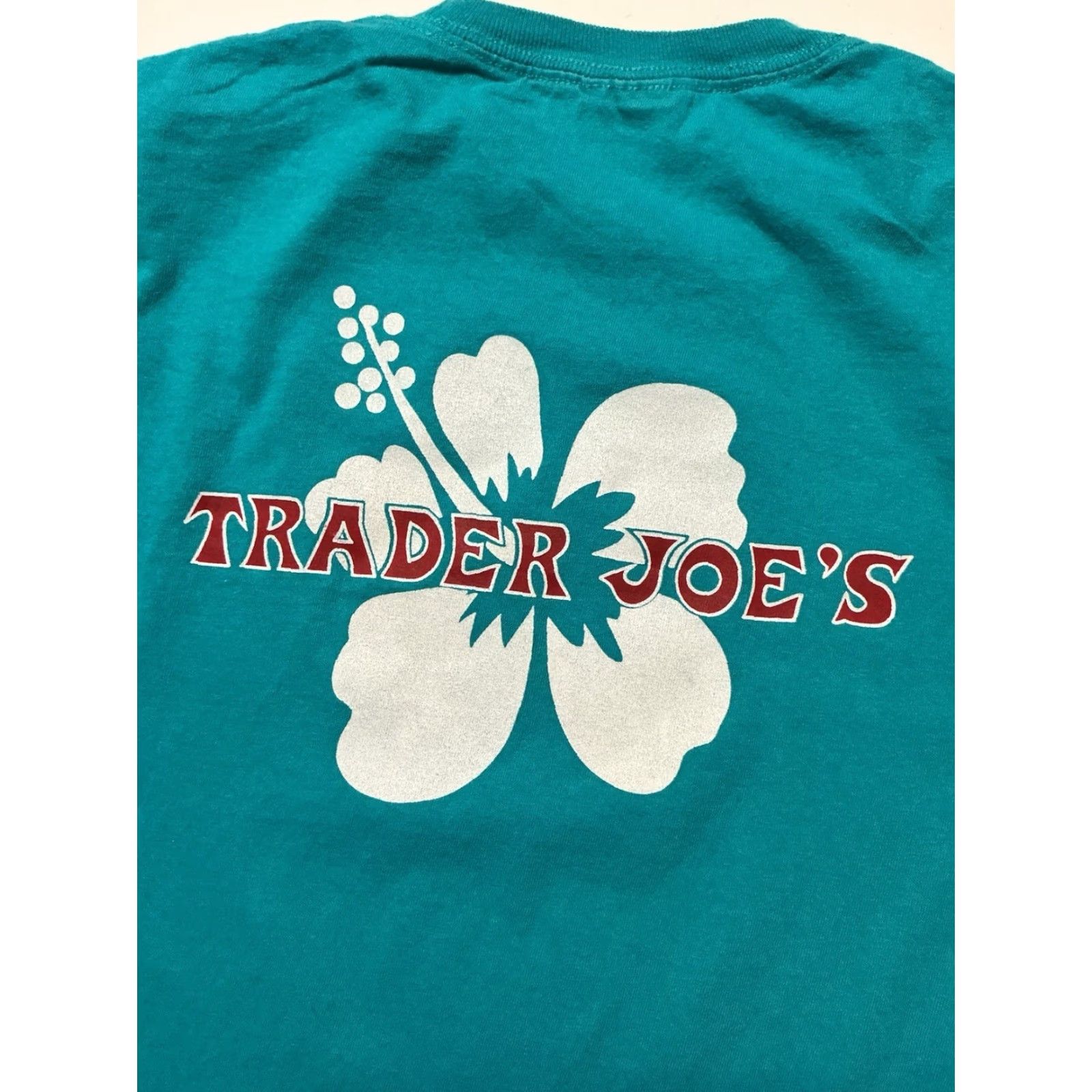 Port & Company VINTAGE Trader Joes Grocery Store Hibiscus Flower Graphic Teal S/S Employee Team Member T-Shirt Sz.L Size US L / EU 52-54 / 3 - 7 Thumbnail