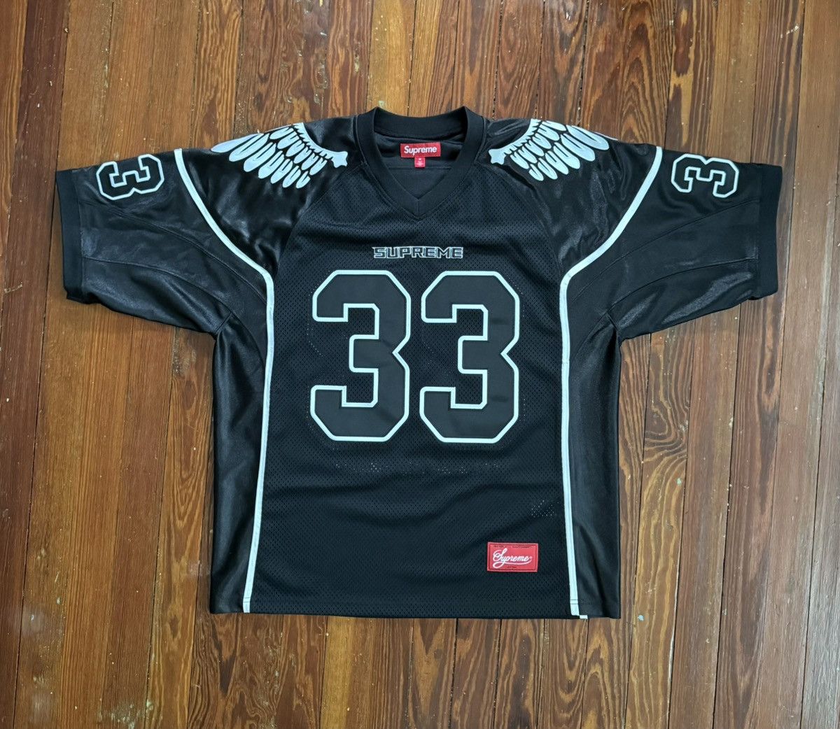 Supreme Supreme Wings Football Jersey Black | Grailed