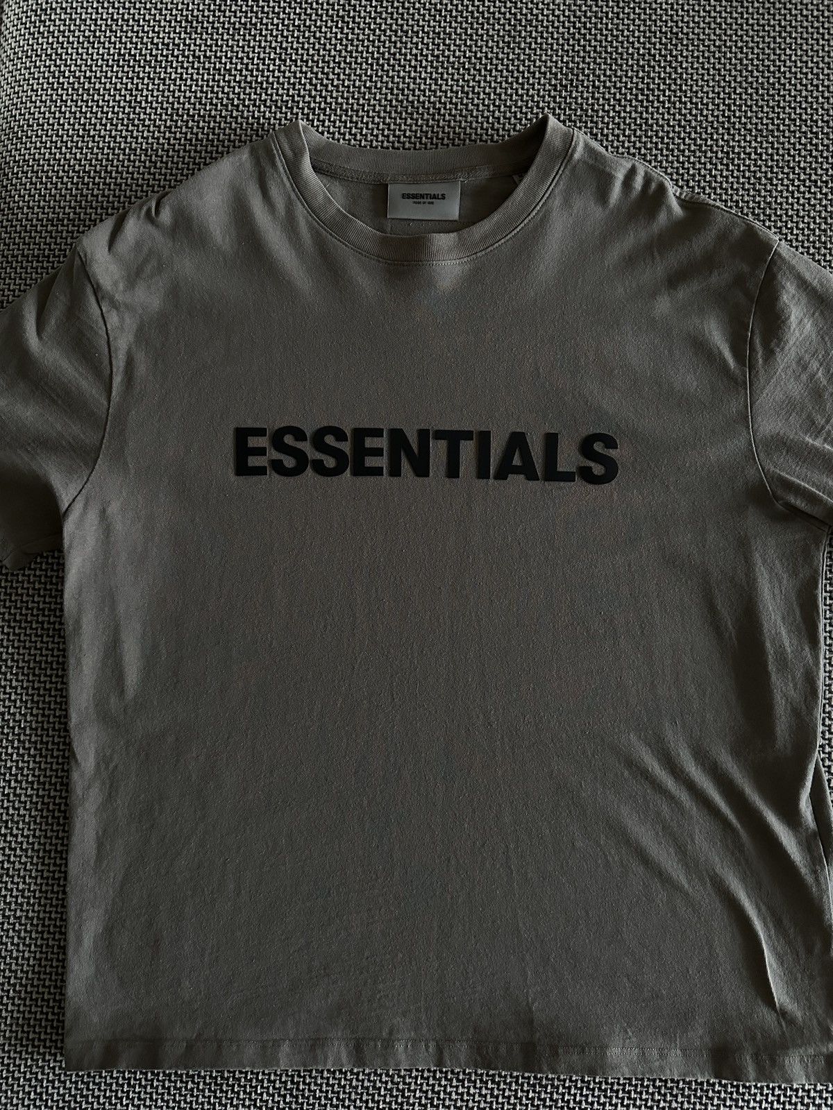 meaning of essentials fear of god shirt