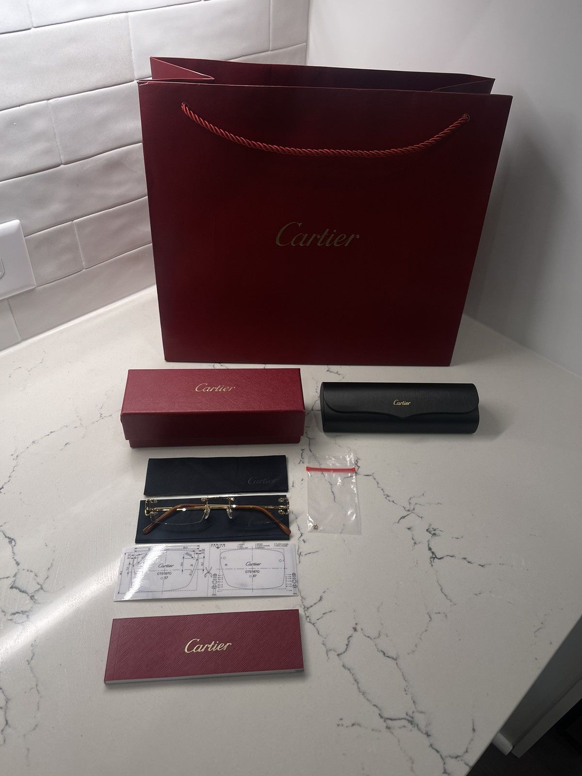 image of Cartier Men’S Rimless Metal Optical Glasses in Gold, Men's