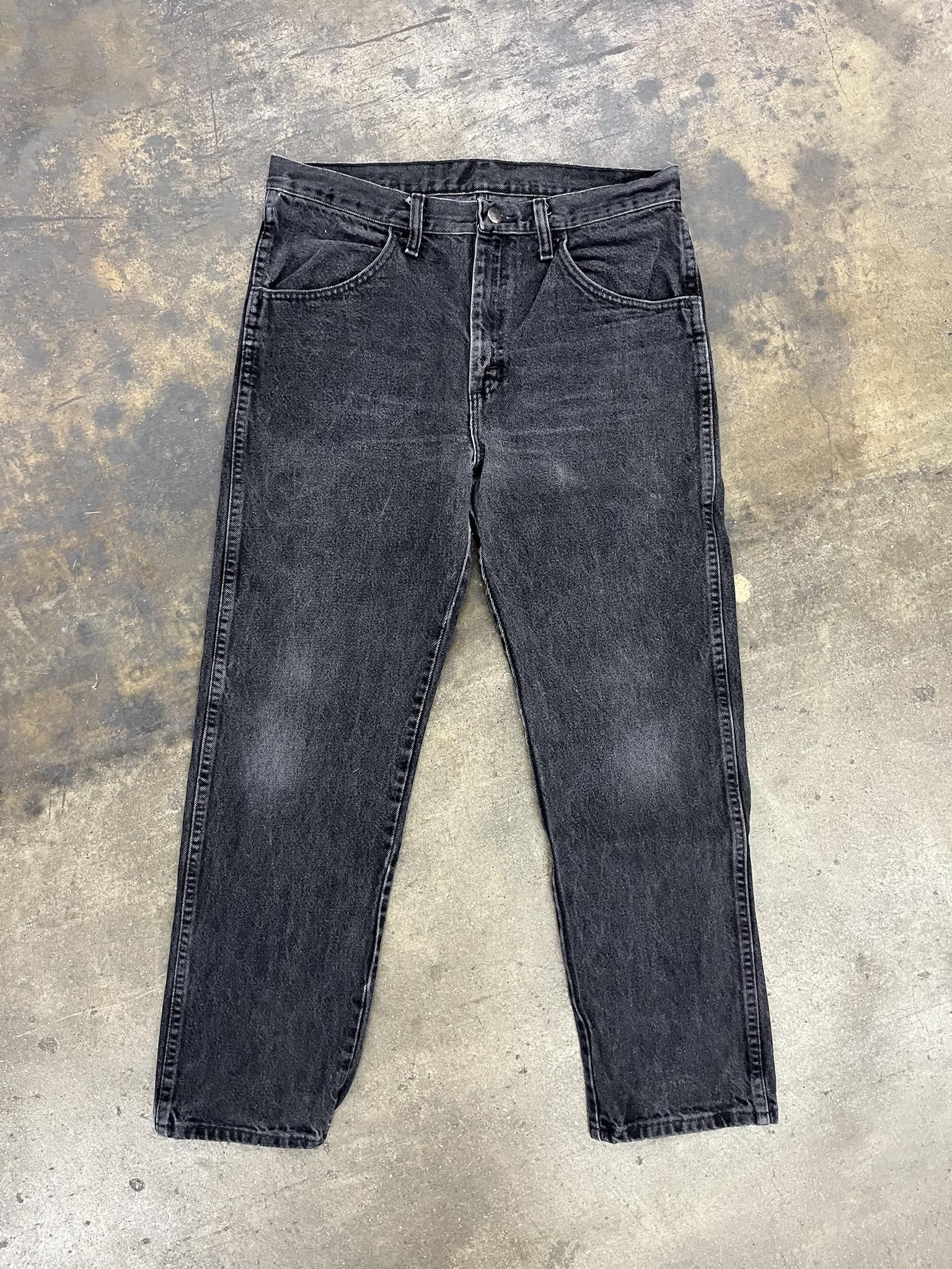 image of Vintage x Wrangler 2000's Rustler Regular Fit With Left Back Pocket Phone Fade in Black (Size 33)