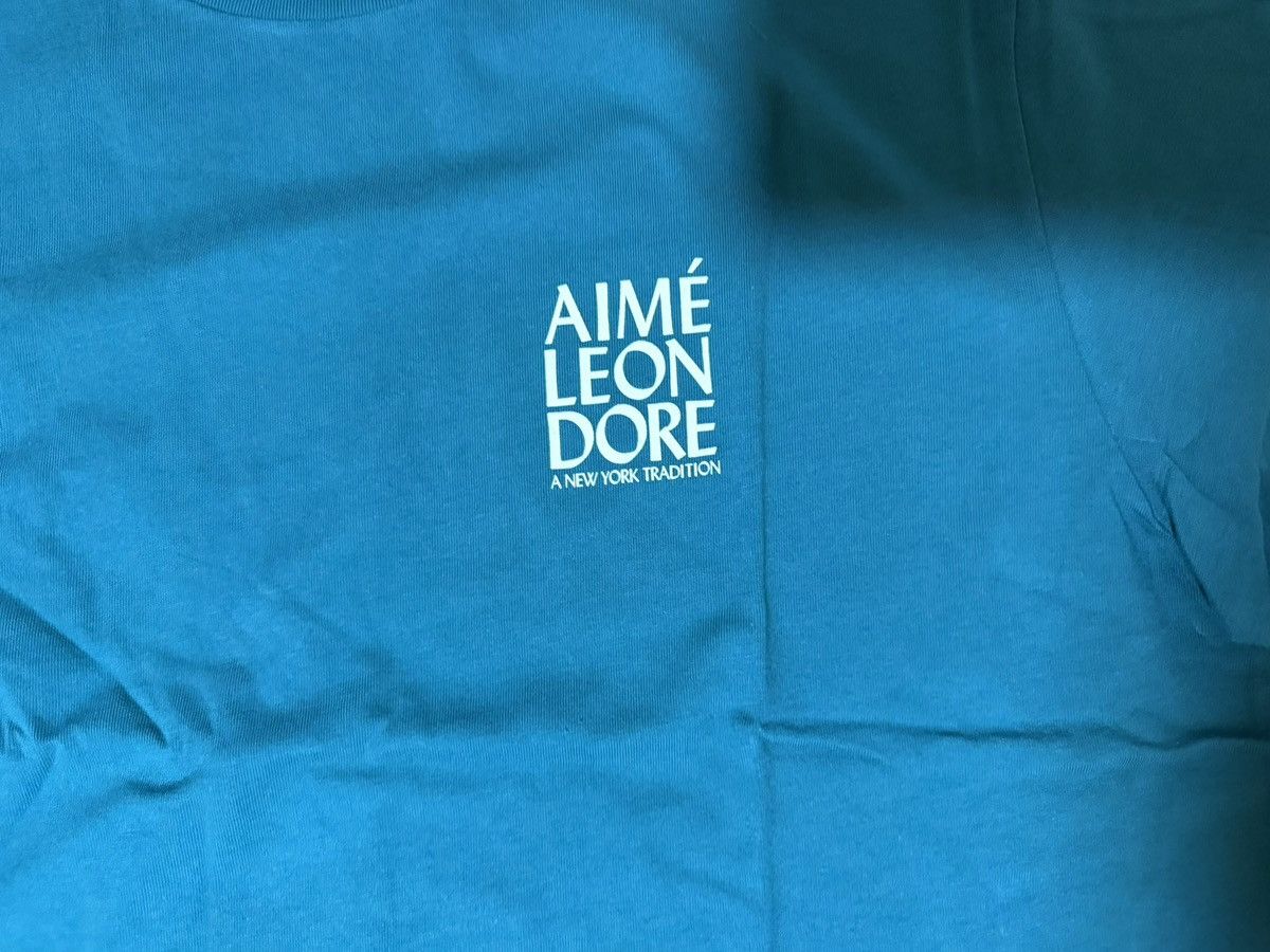 Aime Leon Dore Aime Leon Dore ALD Swimmers Tee “Kayaking” (Teal) Size XL Size US XL / EU 56 / 4 - 6 Thumbnail