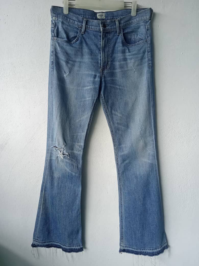 Distressed Ripped Medium Wash Flare Denim