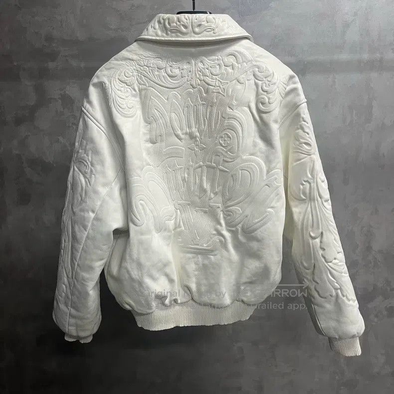 Louis Vuitton Louis Vuitton White solid embossed effect dark leather tun Size US M / EU 48-50 / 2 - 5 Thumbnail