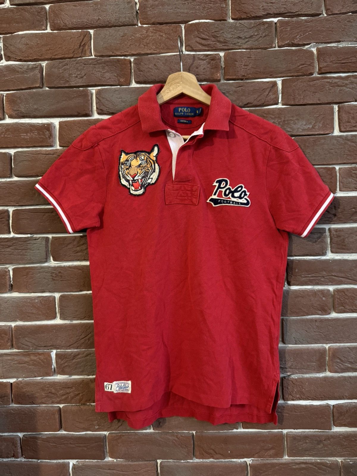 Polo Ralph offers Lauren Football Tiger Costom Fit Polo Size Large