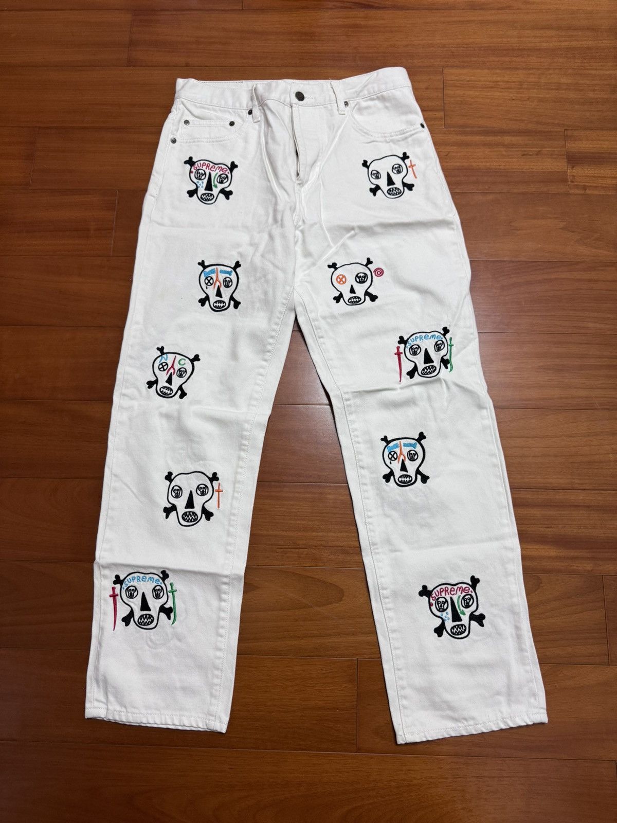 image of Supreme Clayton Patterson Skull Denim Pants in White, Men's (Size 30)