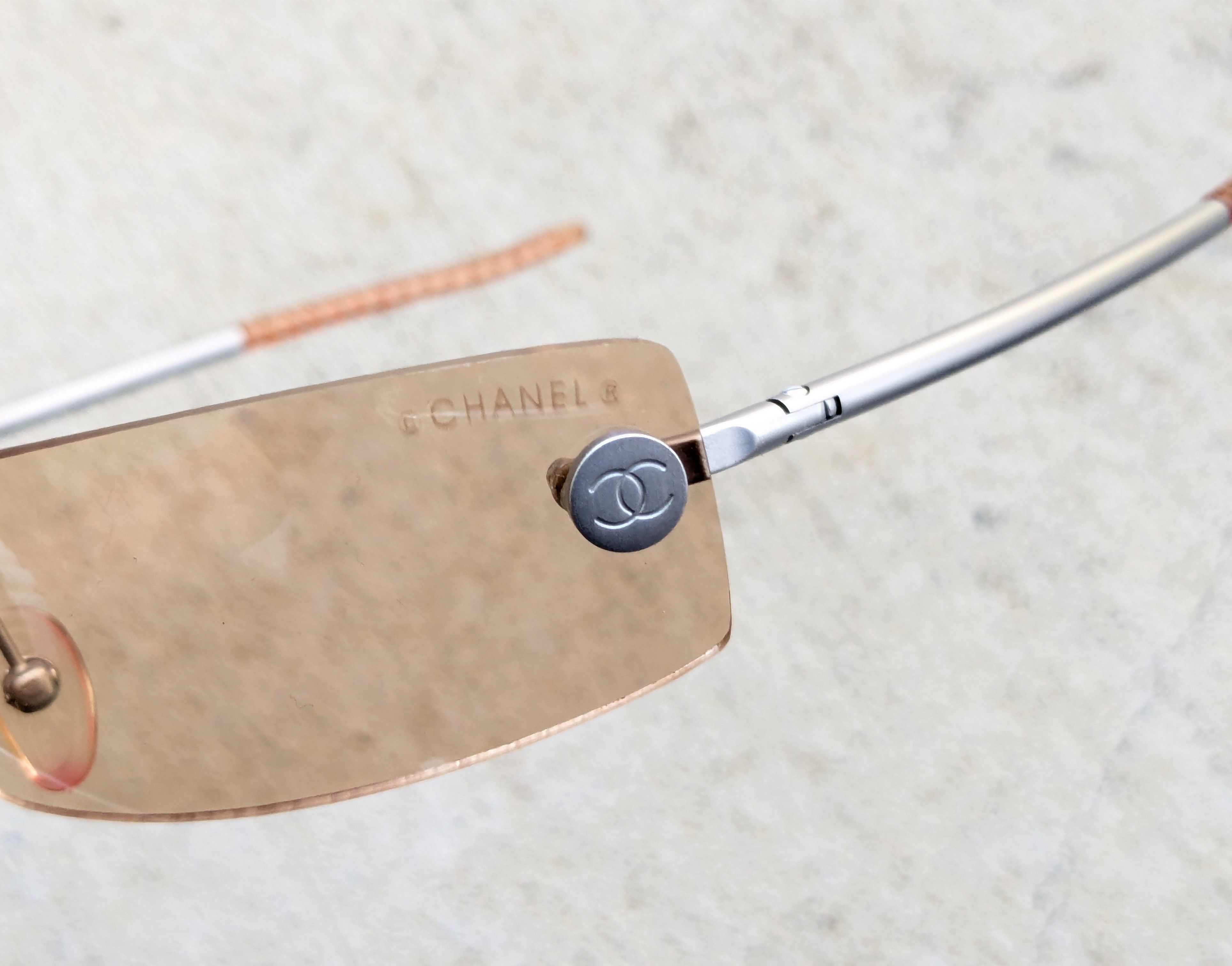 Chanel Chanel Sunglasses CH007 Orange Titanium Rimless Silver Size ONE SIZE - 11 Thumbnail