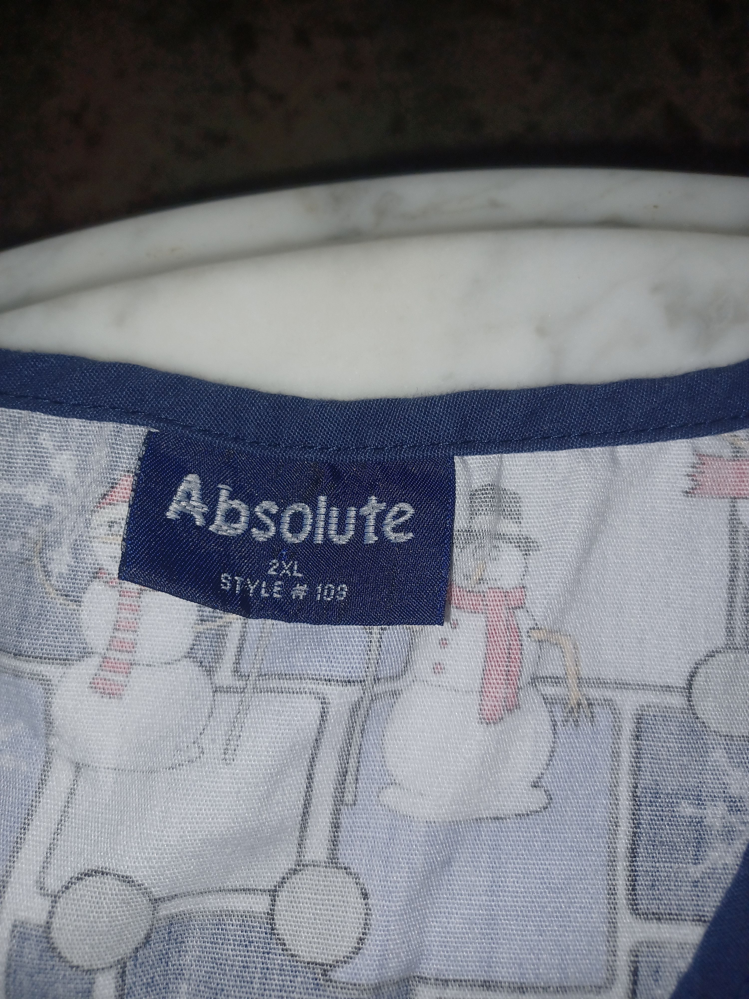 Other Women's Scrub Top Christmas/Winter Theme 2X Lots of Blue Size XXL / US 16-18 / IT 52-54 - 2 Thumbnail