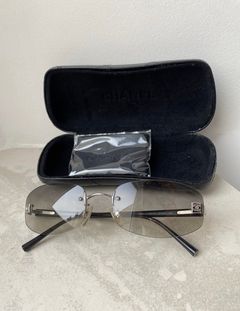 Chanel Black Translucent Rimless Shield Sunglasses ○ Labellov ○ Buy and  Sell Authentic Luxury