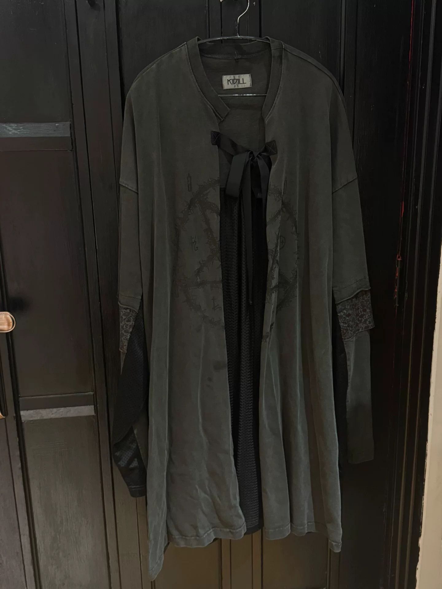 black and gray magic circle cloak