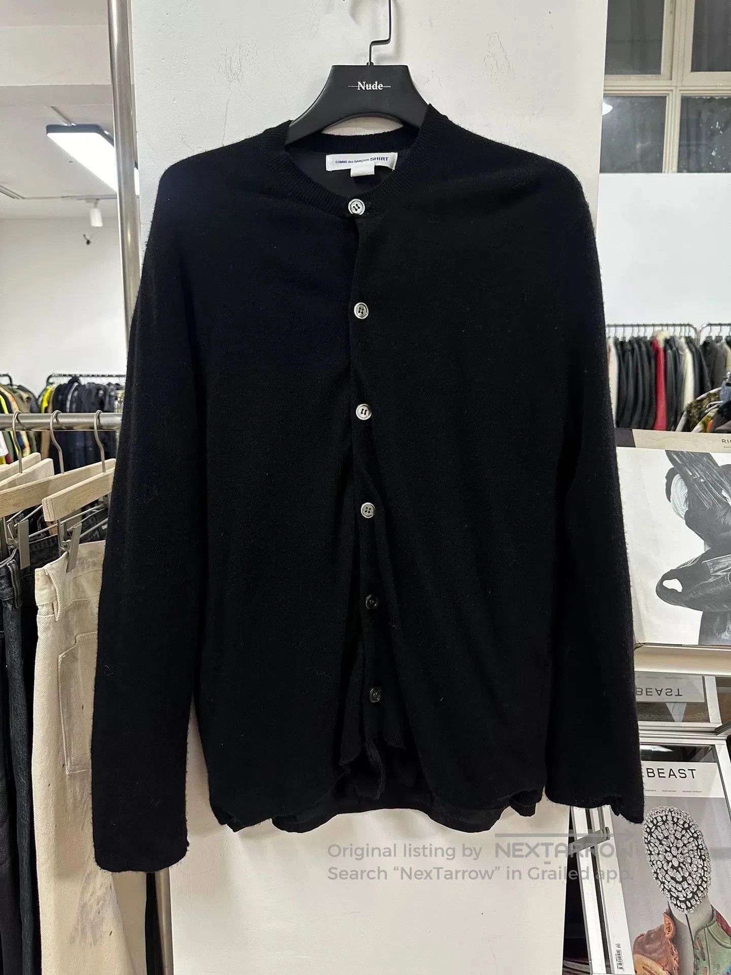 black wool cardigan with buttons.