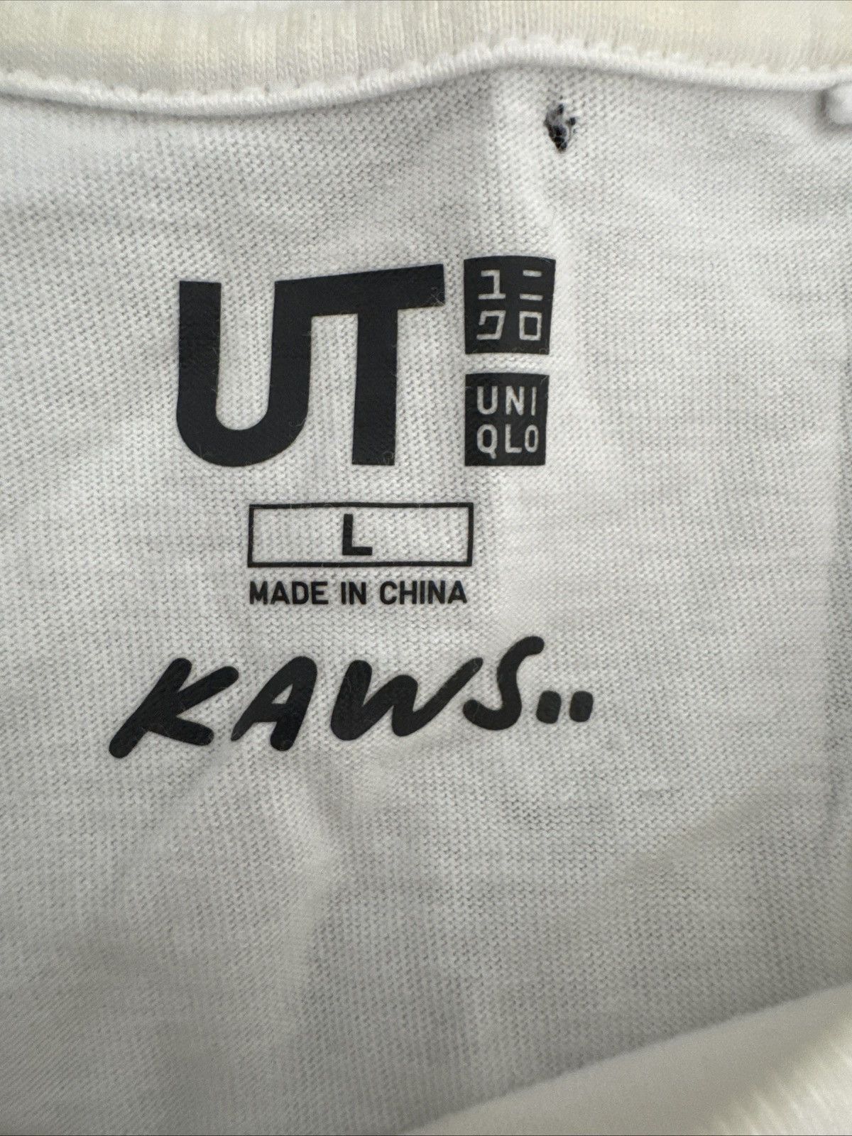 Kaws × Uniqlo KAWS x Uniqlo UT White Short Sleeve Tee Size L Size US L / EU 52-54 / 3 - 4 Thumbnail