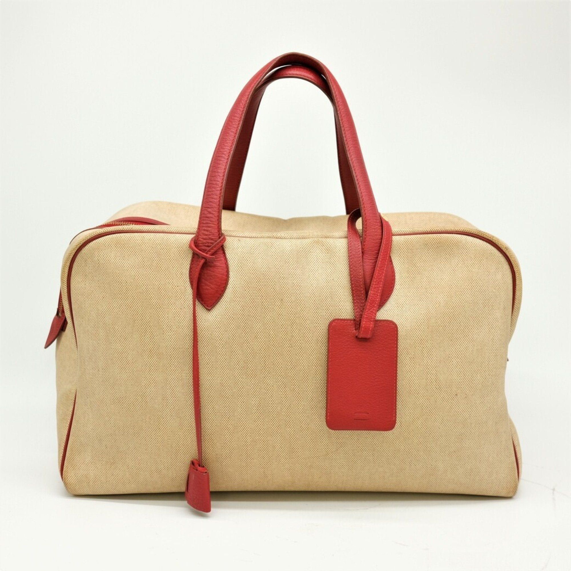 image of Hermes Victoria 43 Boston Bag Toile H Leather Red in White, Women's