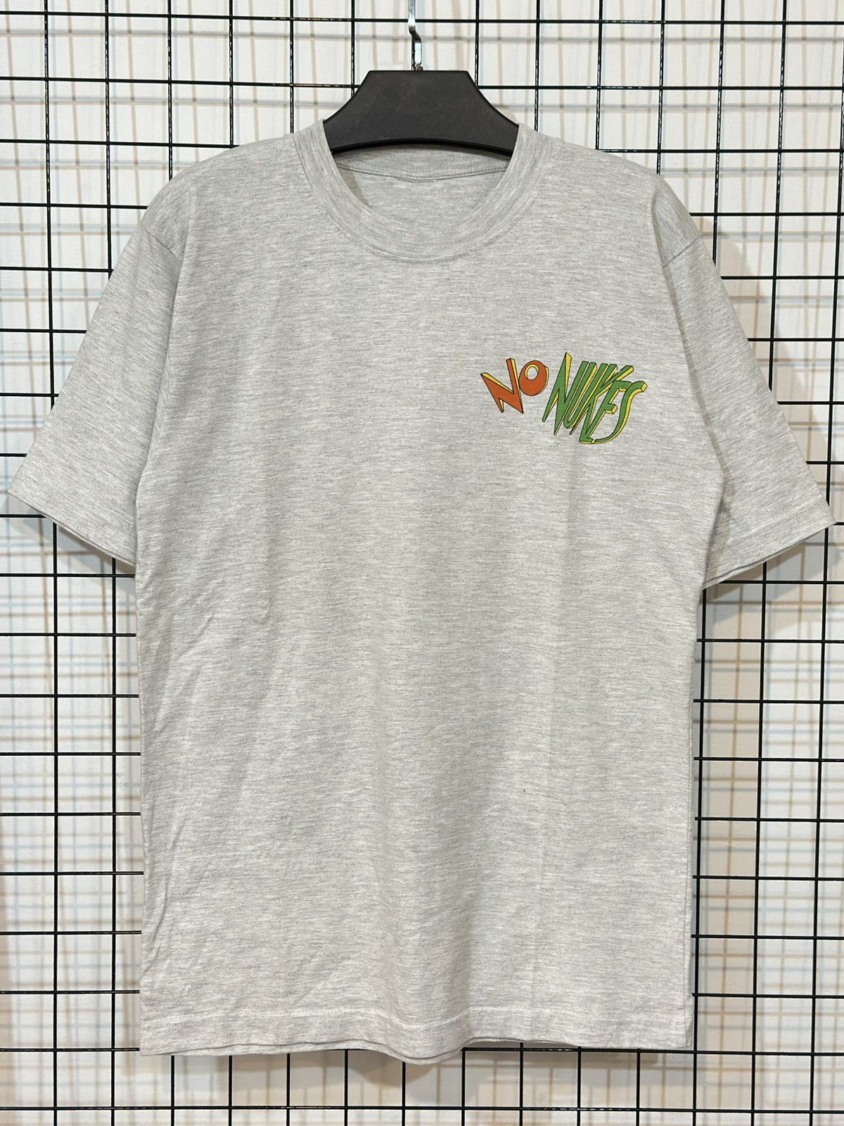 Vintage Vintage t-shirt featuring a "No Nukes" . Size US L / EU 52-54 / 3 - 4 Thumbnail