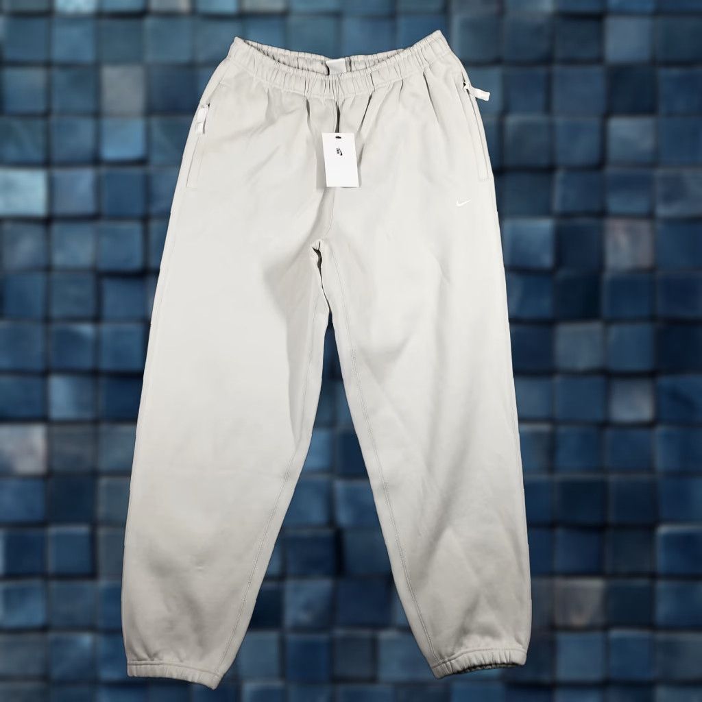 Nike Nike Solo Swoosh Fleece Sweatpants Mens Medium Platinum Tint Joggers DX1364 Size US 31 - 1 Thumbnail