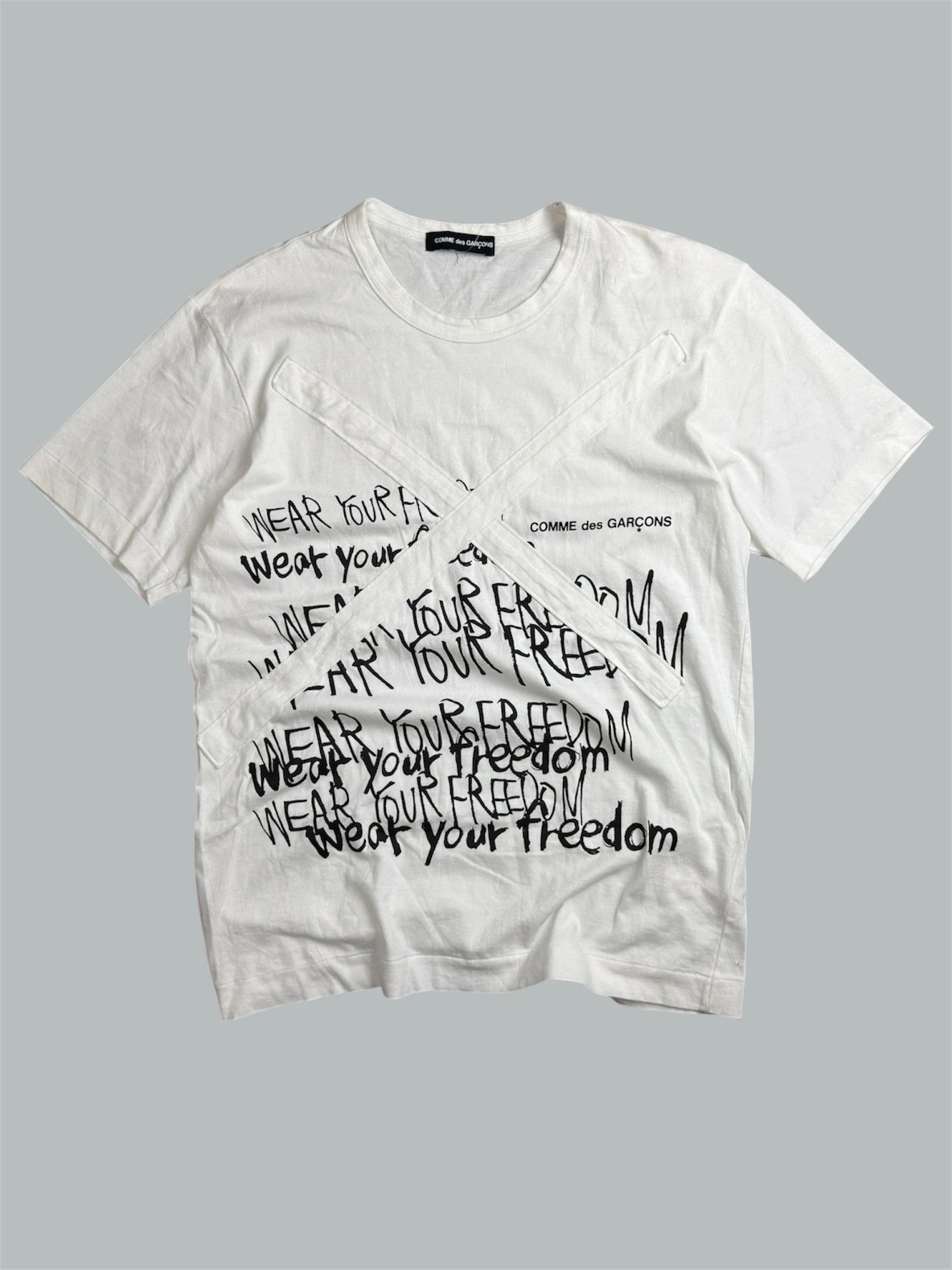 Comme des Garcons Comme Des Garcons “Wear Your Freedom” White T