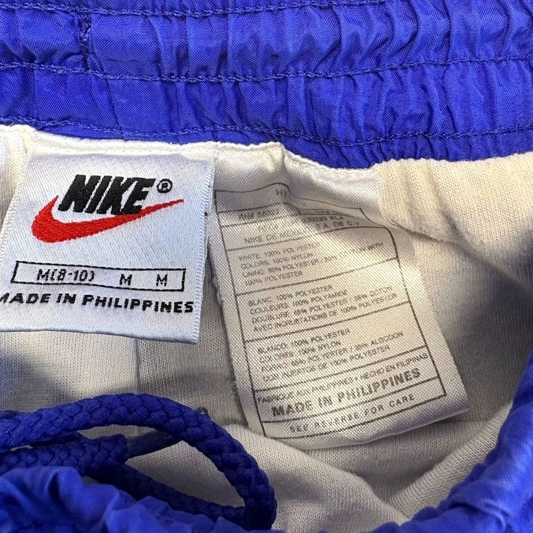 Nike VINTAGE Nike Track Pants M Blue Nylon Windbreaker Ankle Zip Embroidered Swoosh Size US 31 - 4 Thumbnail