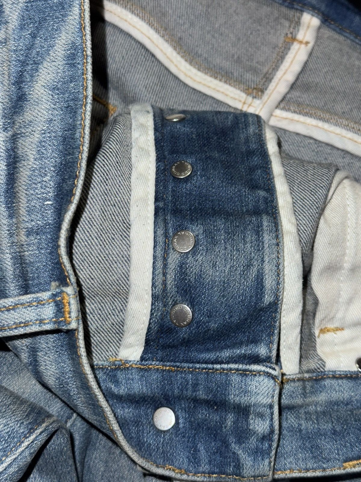 AMIRI BLUE DISTRESSED JEANS