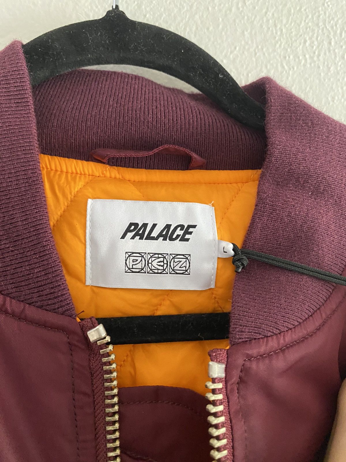 Palace x PEZ “Pezman” MA-1 Bomber – FW21 - Burgundy