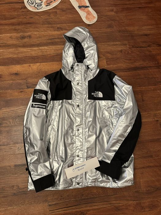 Supreme the north face metallic mountain hot sale parka silver