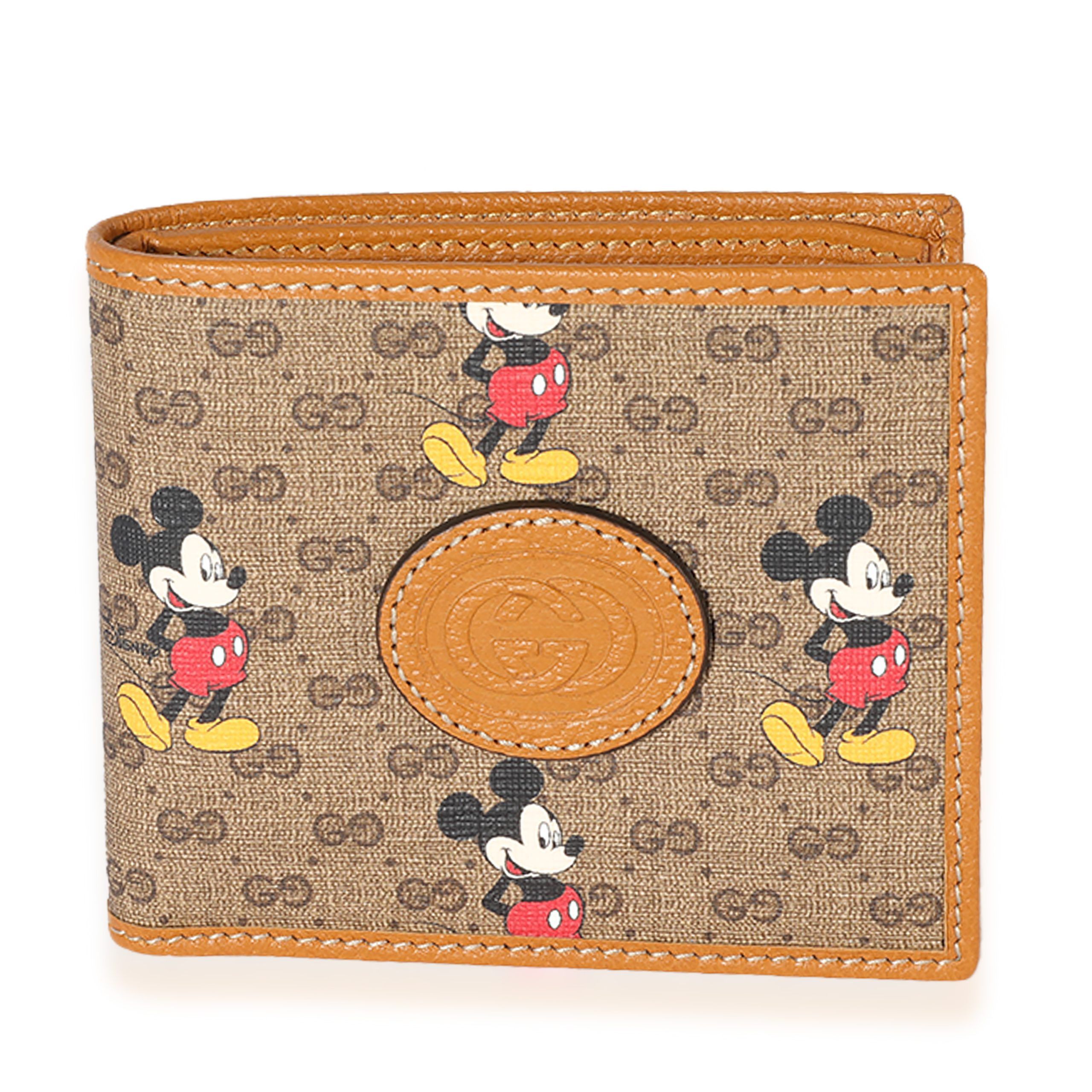 image of Gucci X Disney Vintage GG Supreme Mickey Mouse Bifold Wallet in Brown, Women's