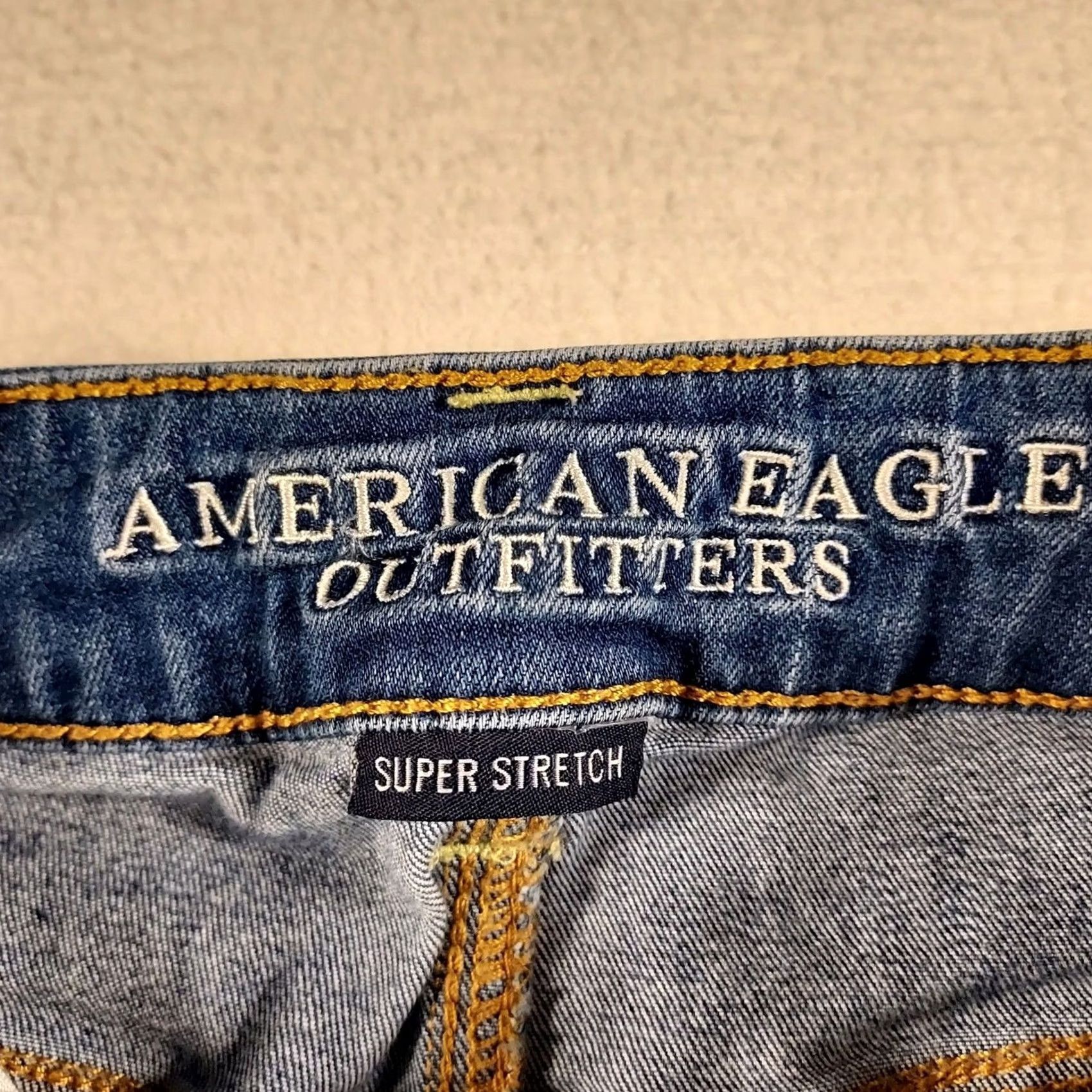 American Eagle Outfitters American Eagle Outfitters Super Stretch Jean Shorts Size 4 Flat Front Zip 4 Inseam Blue Distressed Frayed Hem Women Regular Hi Rise Shortie Shorts Size 27" / US 4 / IT 40 - 3 Thumbnail