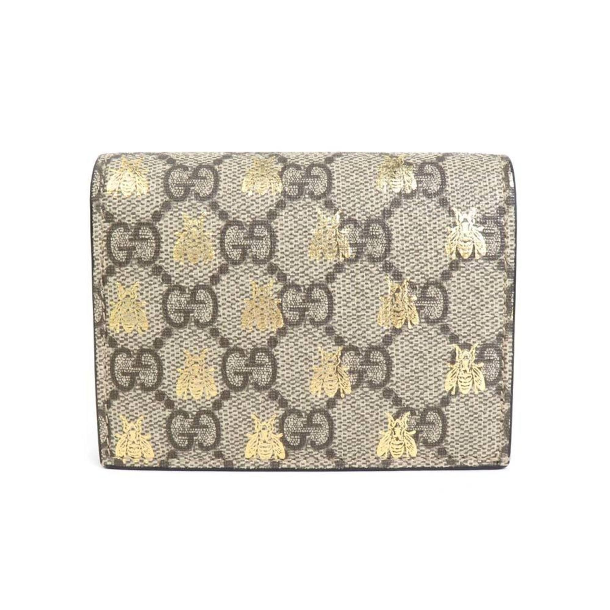 image of Gucci Portefeuille Animalier Wallet in Brown, Women's