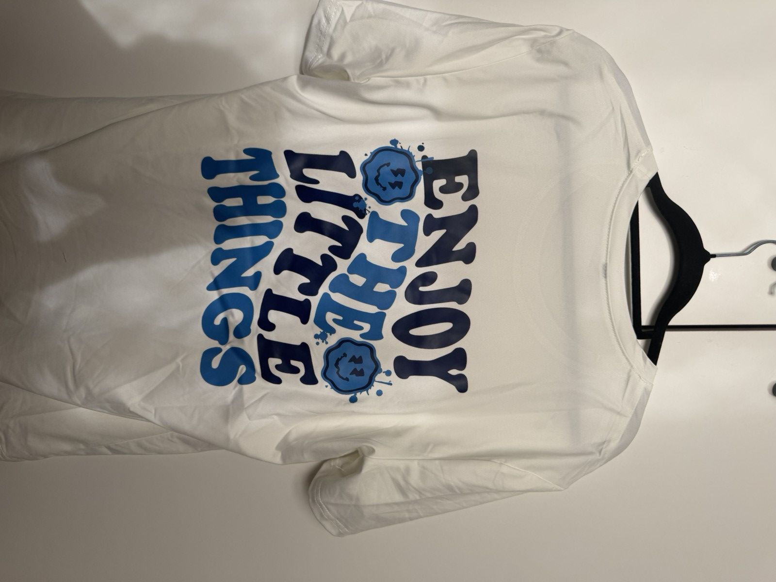 White cotton t-shirt with blue smiley face design #skater