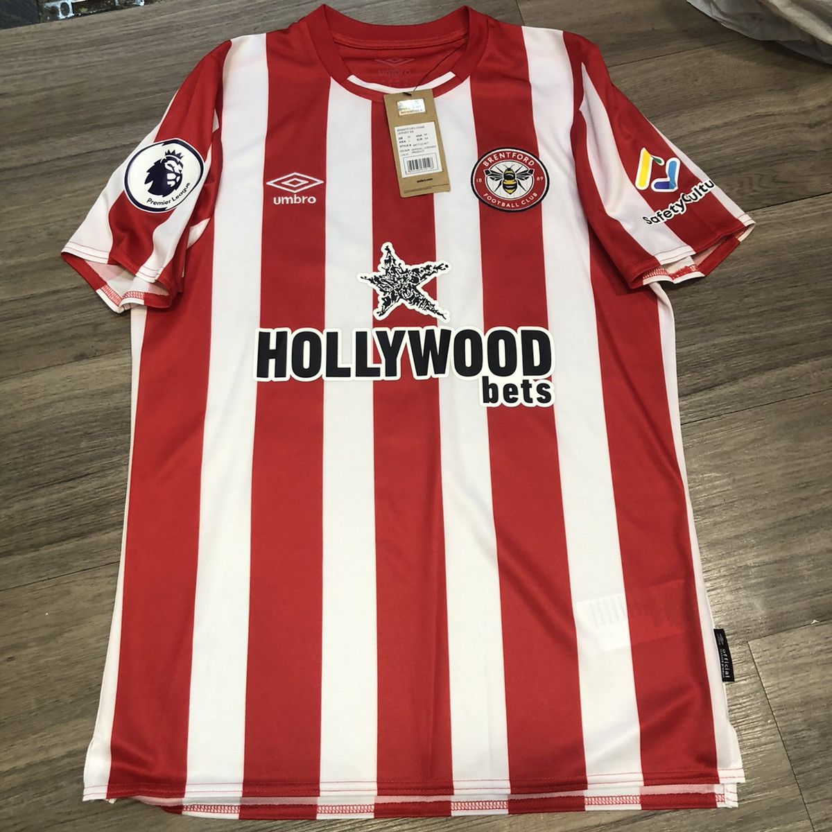 image of Soccer Jersey x Umbro Brentford 21/22 Home Shirt 21 Eriksen in Red/White, Men's (Size Medium)