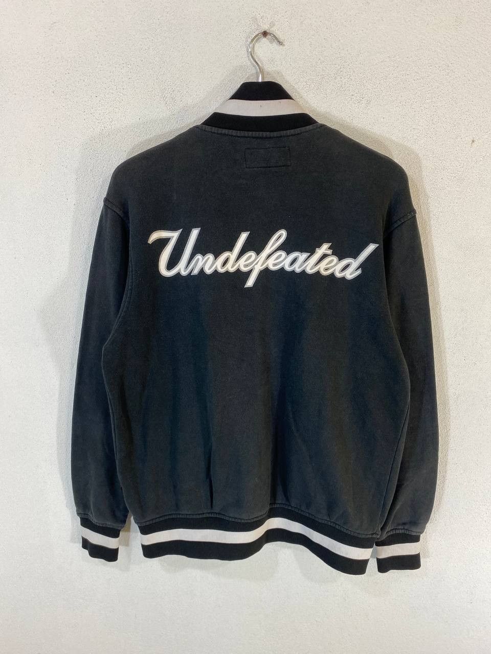 Undefeated undefeated black jacket spell out backhit nice design Size US M / EU 48-50 / 2 - 8 Thumbnail
