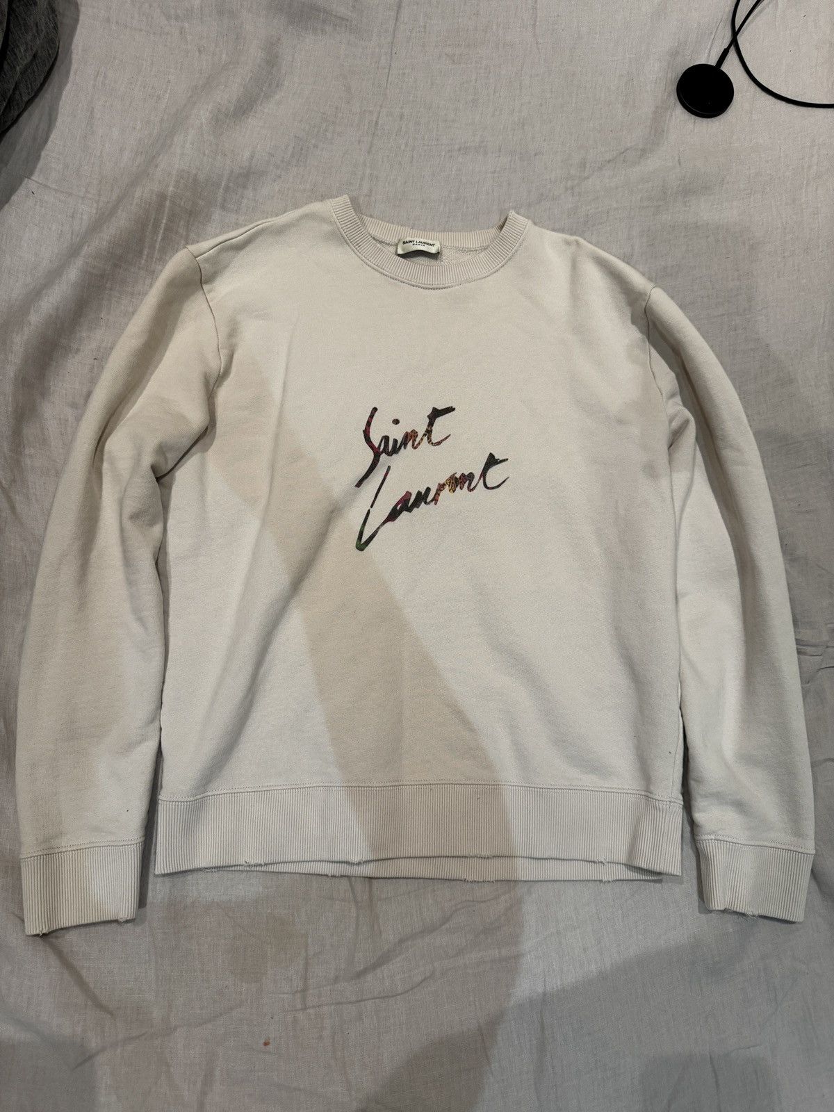 image of Saint Laurent Paris Saint Laurent Distressed Logo Sweatshirt in White, Women's (Size Small)