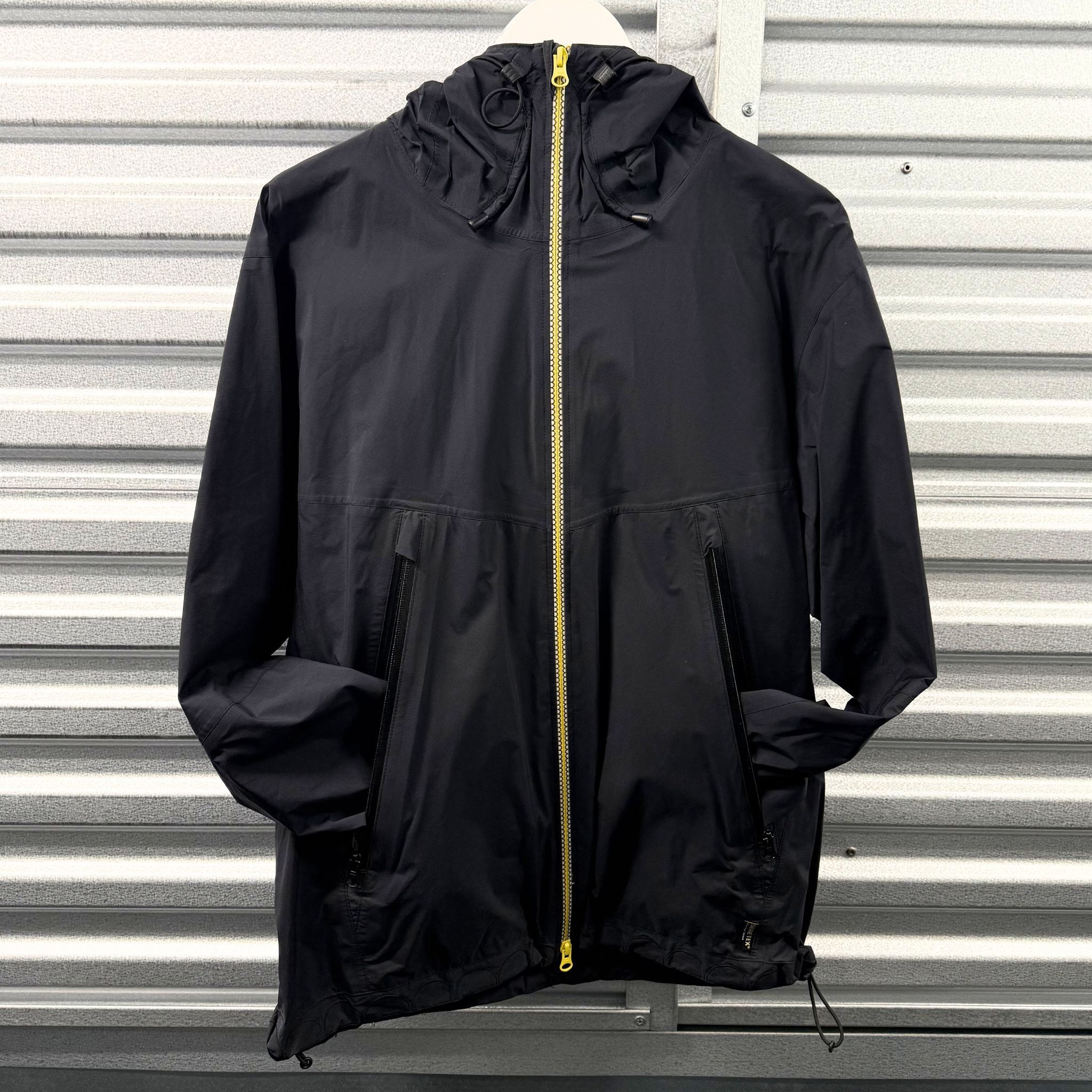 ORIGINALFAKE KAWS Archival Black Gore-Tex Hooded Jacket
