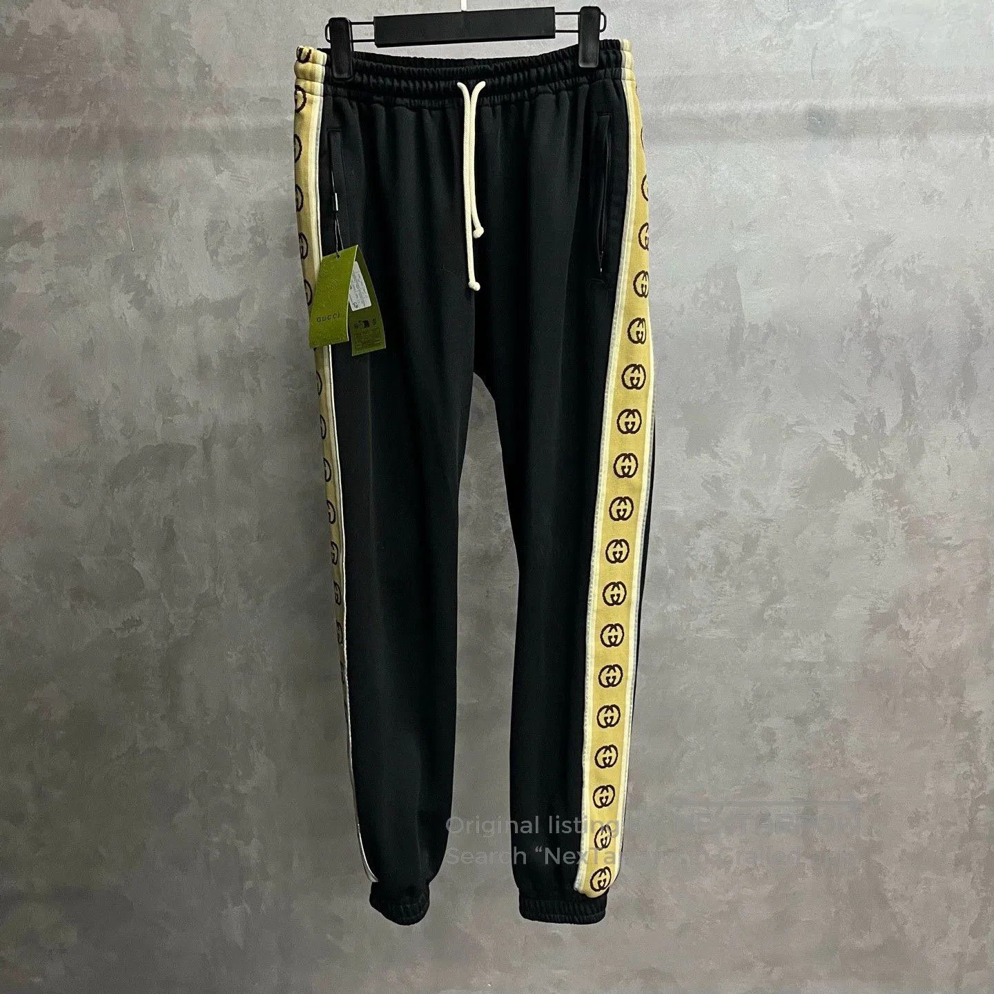 Gucci black logo print knitted sports pants. Size US 26 / EU 42 - 1 Thumbnail
