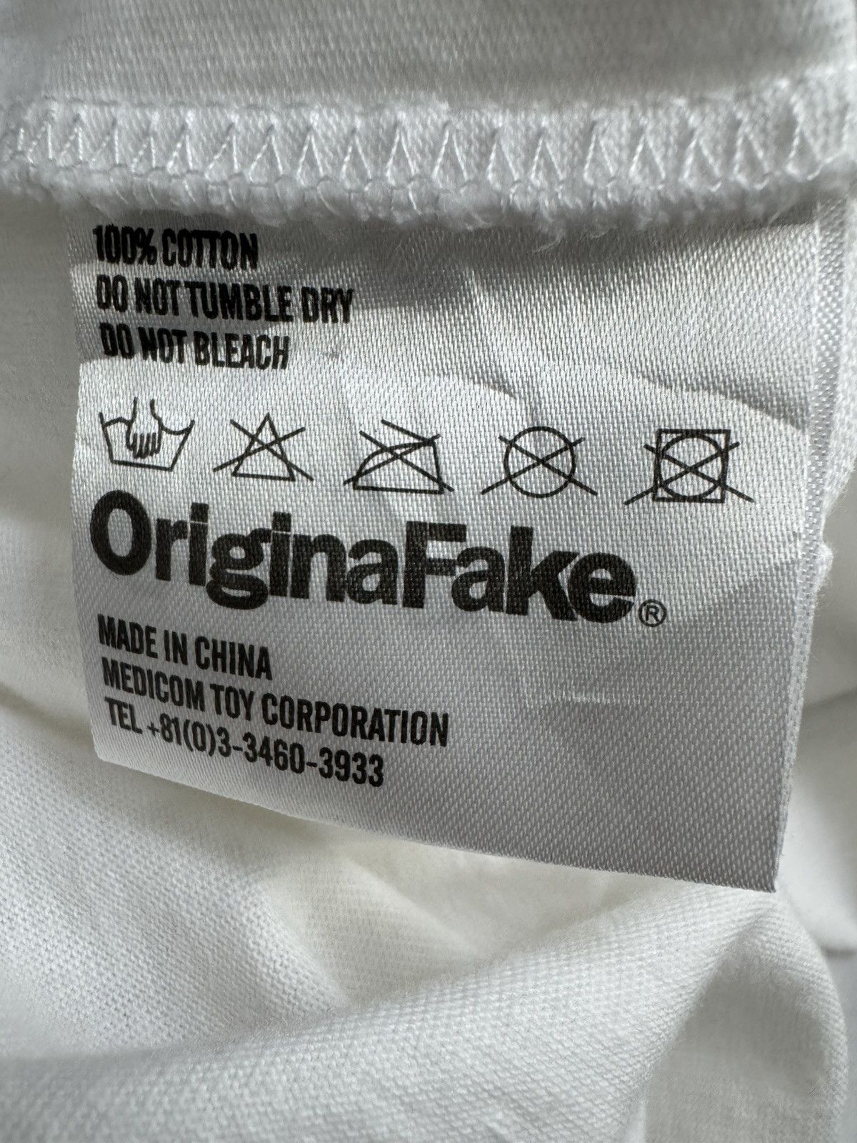 Original Fake KAWS + Original Fake Pink Accomplice shirt. Size US M / EU 48-50 / 2 - 9 Thumbnail