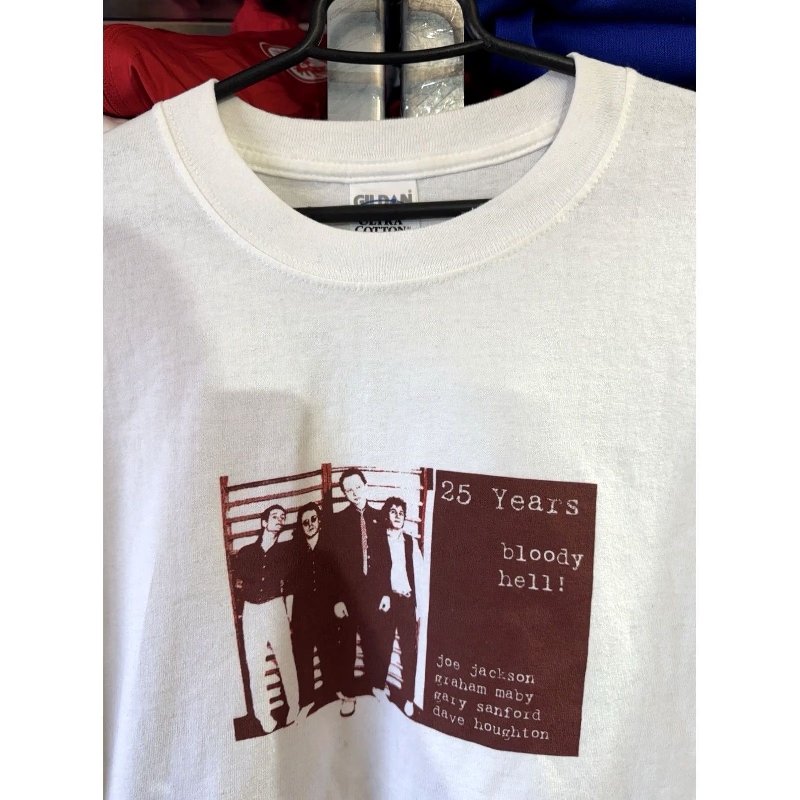Gildan VINTAGE Joe Jackson Band Shirt XL White Mens T-shirt 25 Years bloody hell! Sizes XL Shirt Men White 25 Years Decade 1980s 1990s Concert Merch Size US XL / EU 56 / 4 - 4 Thumbnail