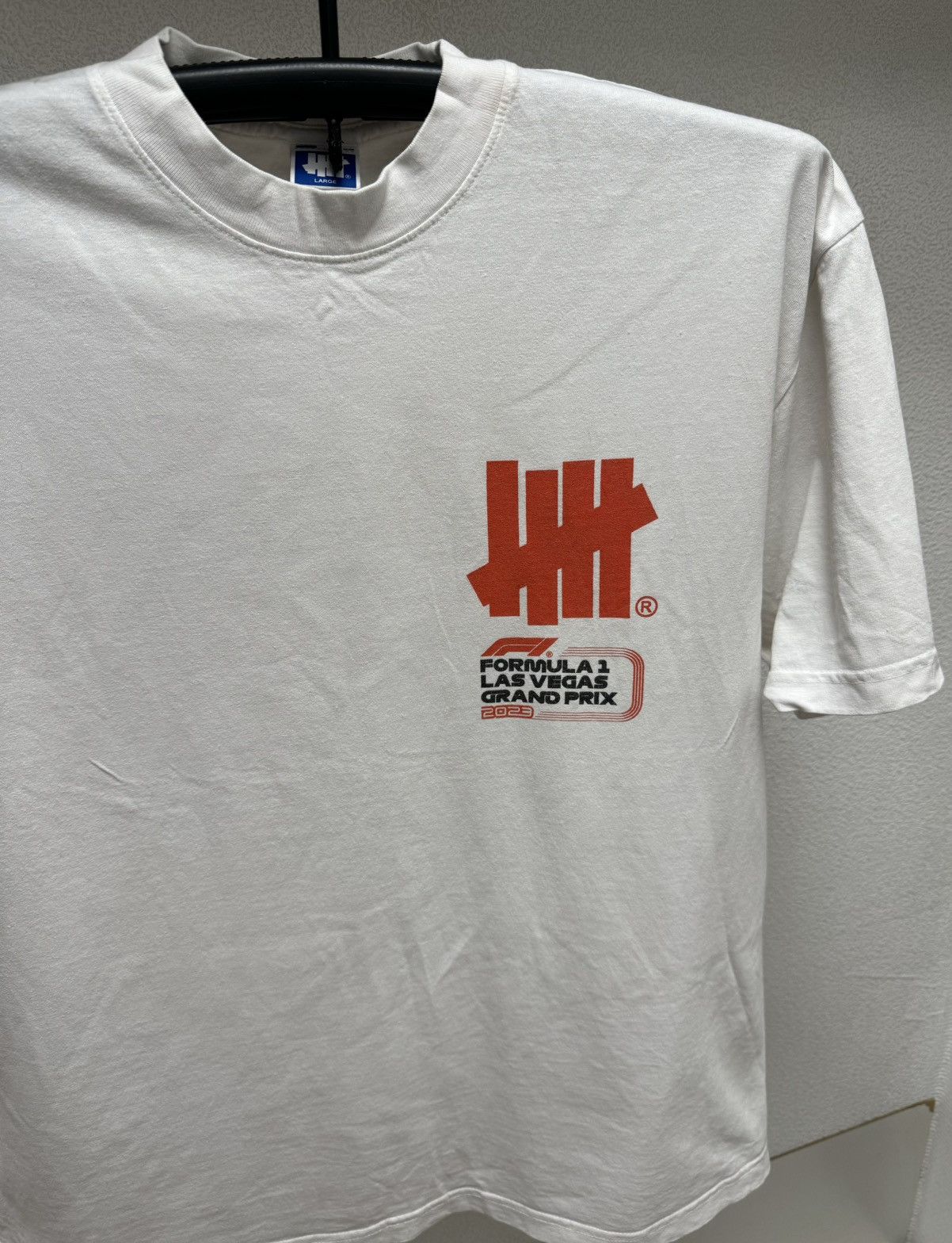 Undefeated Undefeated Formula 1 big logo white t-ahirt L sz UNDFTD las Size US L / EU 52-54 / 3 - 9 Thumbnail